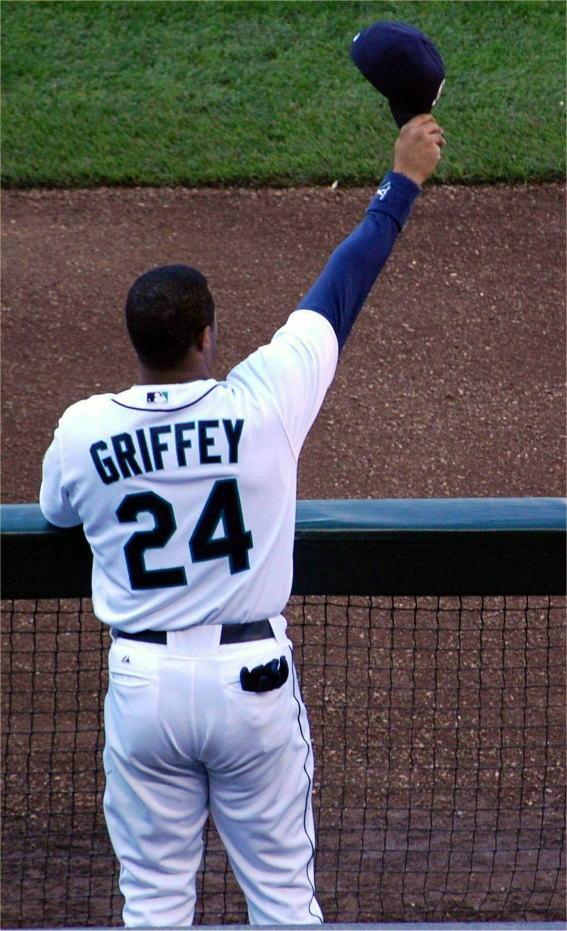 Ken Griffey Jr. Raising Mariners Hat Background