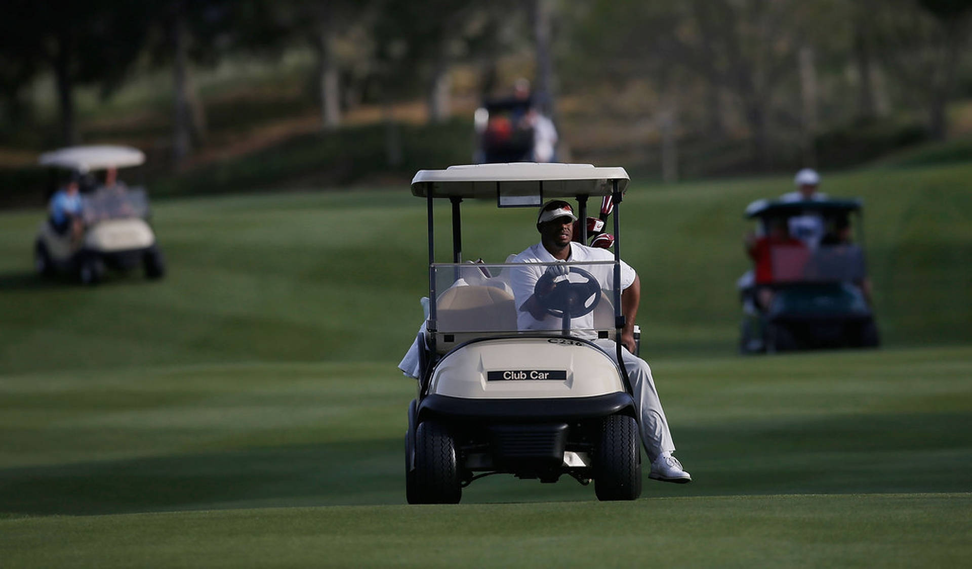 Ken Griffey Jr. Riding Golf Cart Background