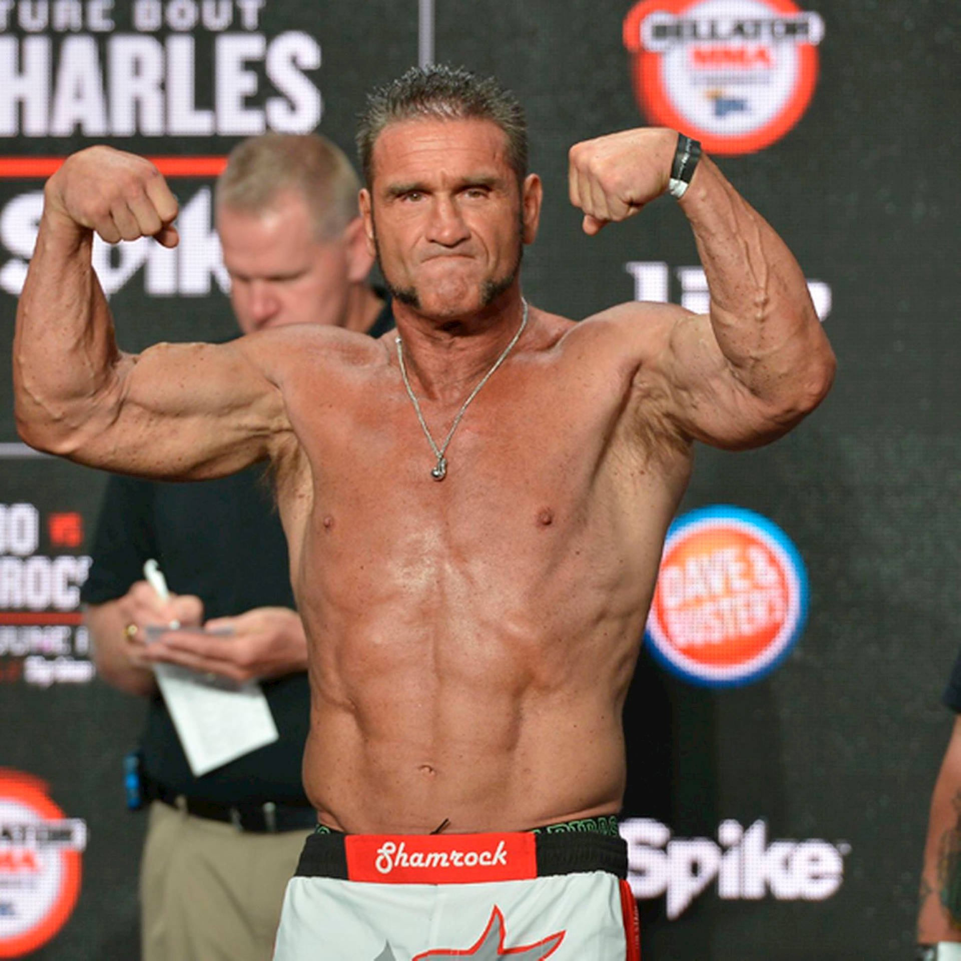 Ken Shamrock Biceps Background