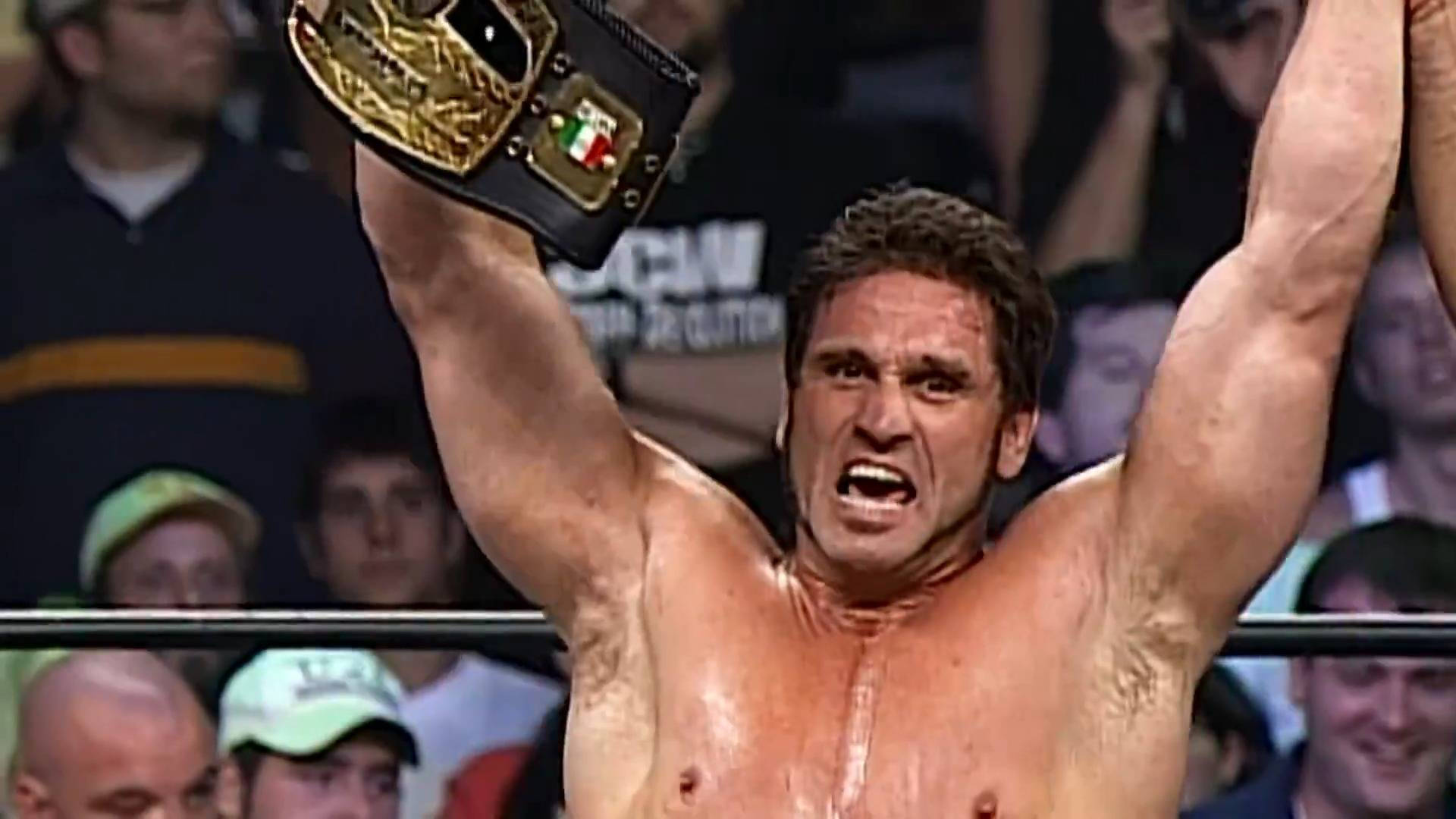 Ken Shamrock Celebrating Victory Background