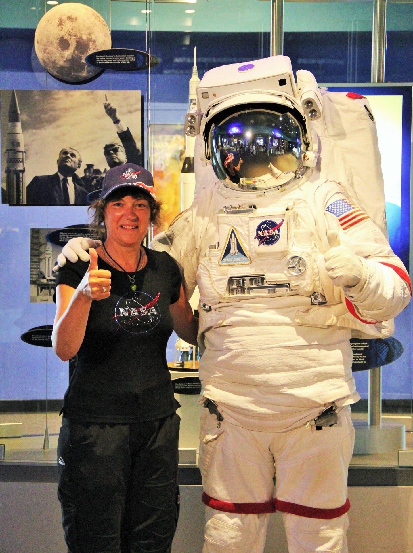 Kennedy Space Center Woman With Astronaut Background