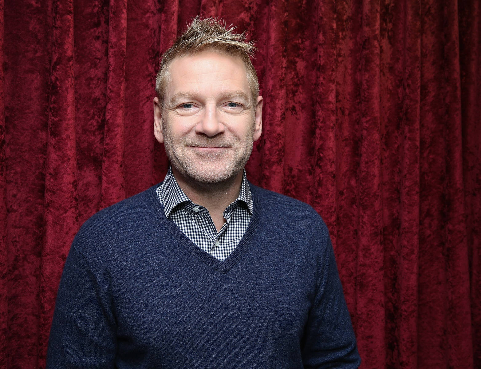 Kenneth Branagh In Red Backdrop Background