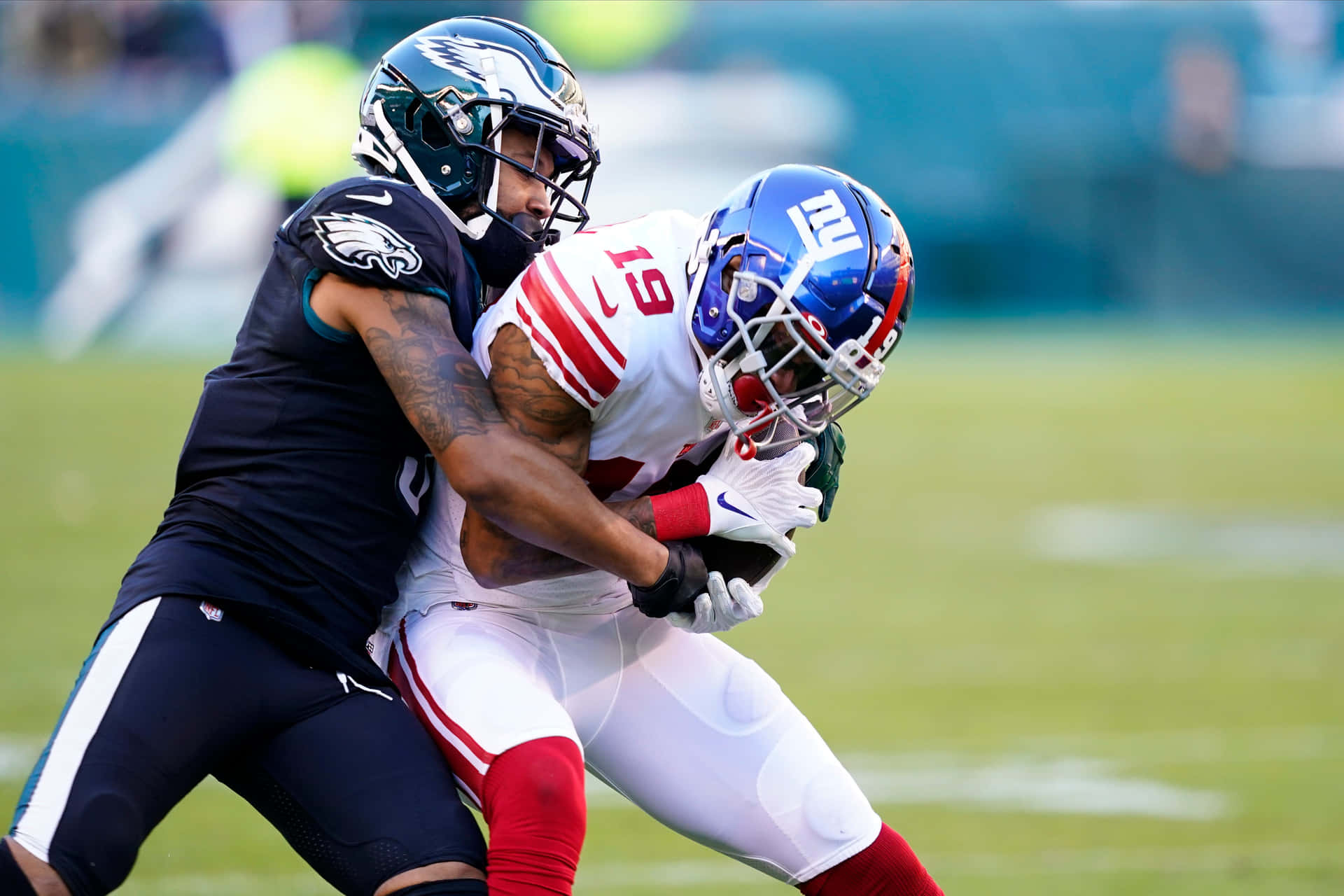 Kenny Golladay Intense Football Tackle Background