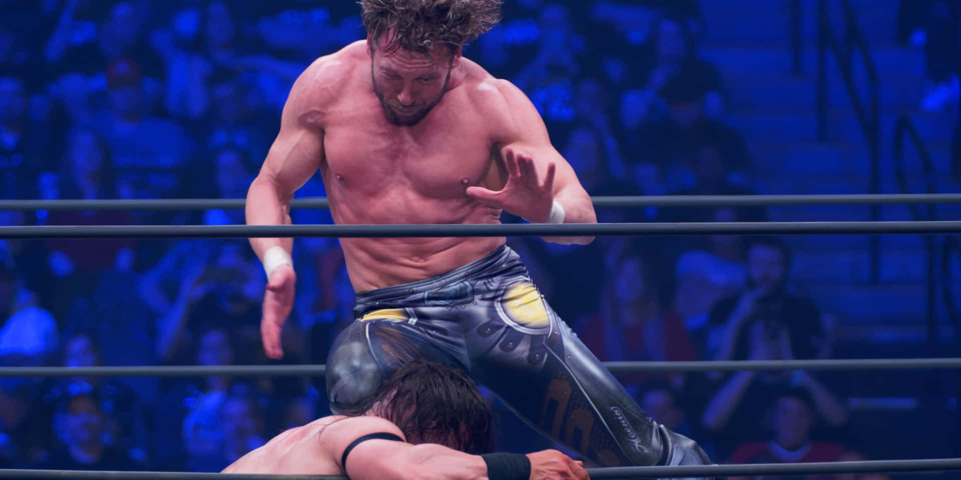 Kenny Omega V Trigger In Aew All Out Background