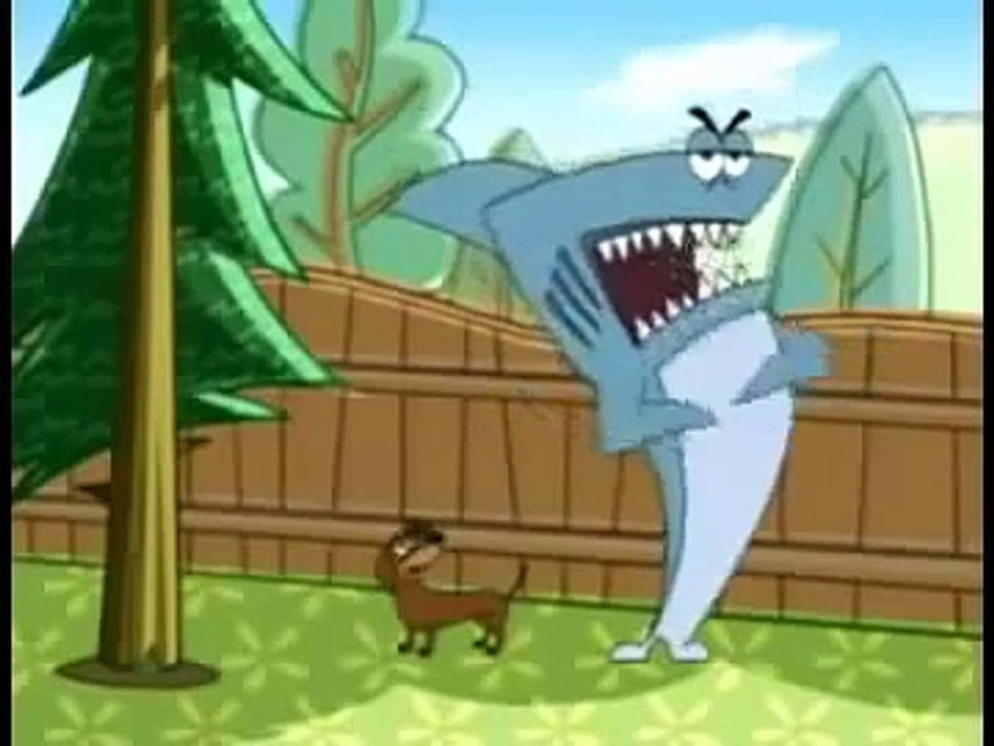 Kenny The Shark Swimming In The Deep Blue Ocean Background