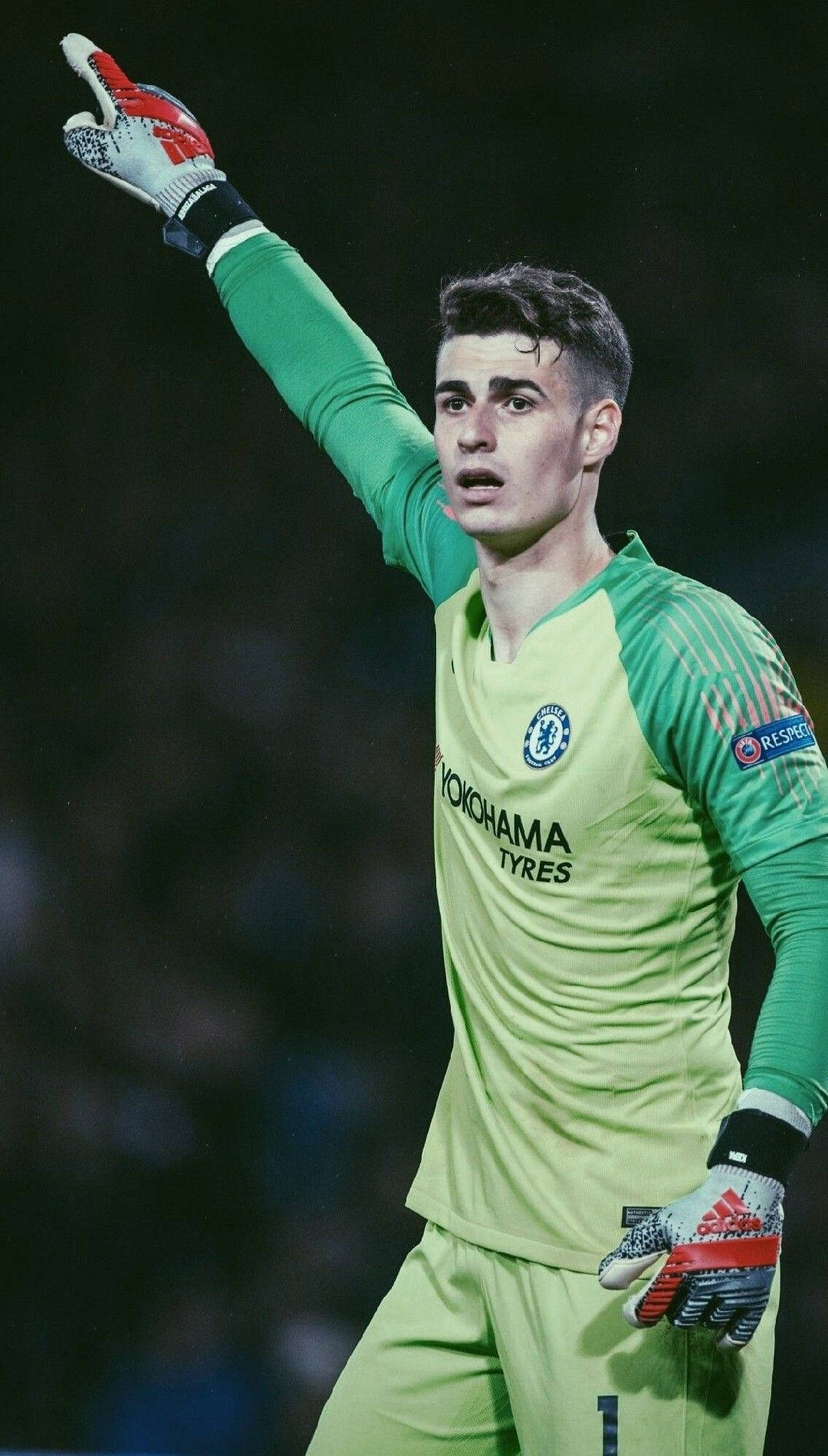 Kepa Arrizabalaga Raising Right Arm Background