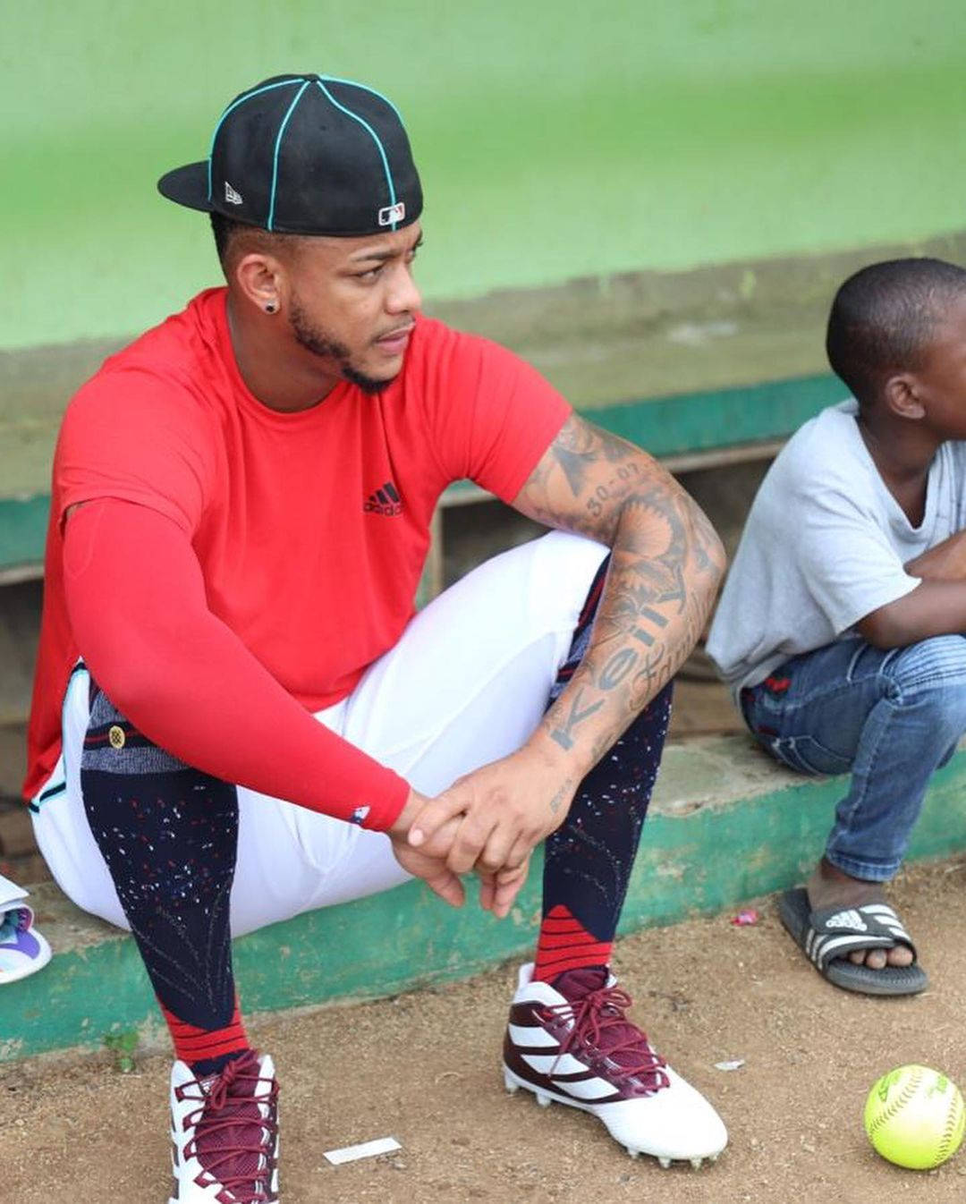 Ketel Marte Showing Off Arm Tattoo Background