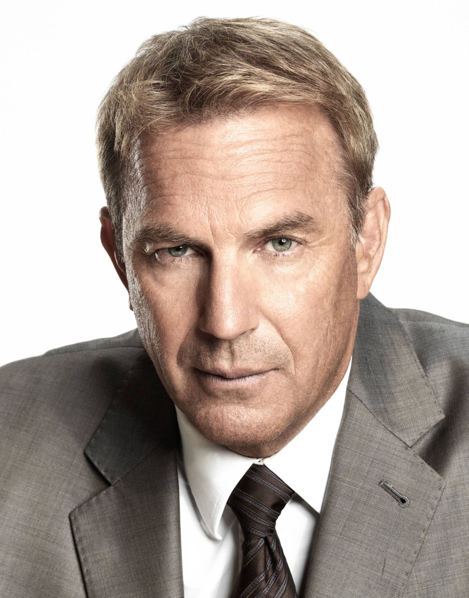 Kevin Costner In Suit And Tie Background