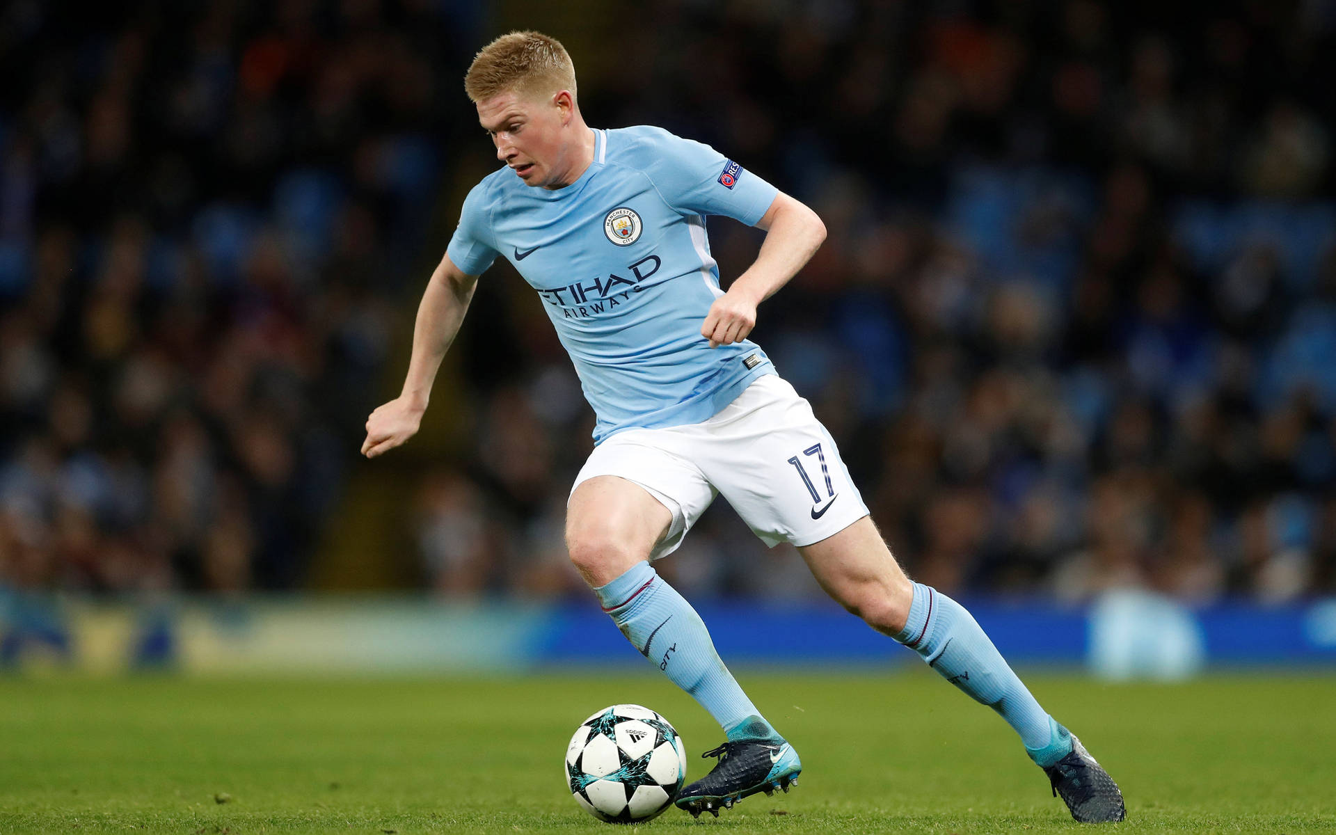 Kevin De Bruyne Playing In The Field Background