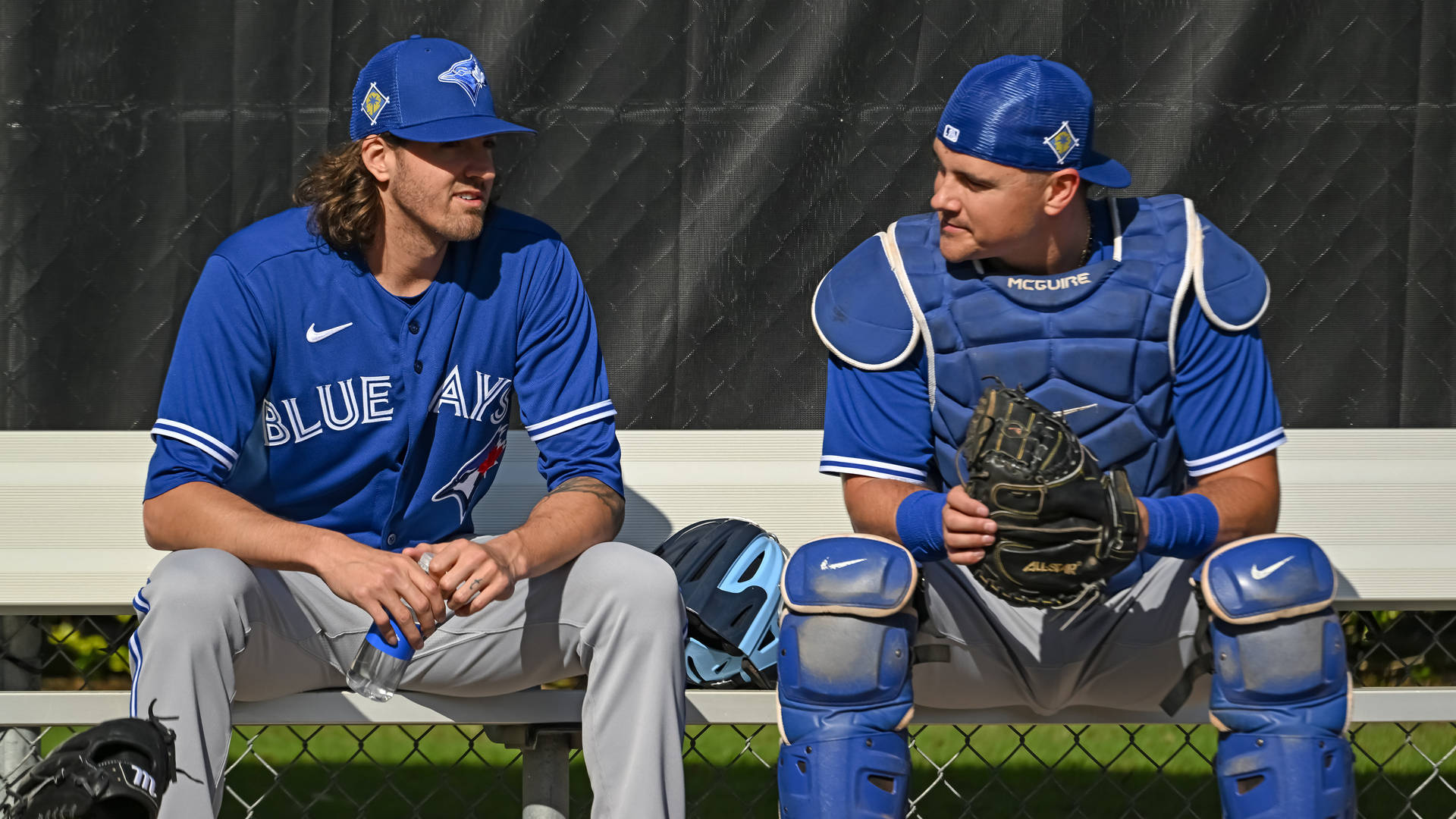 Kevin Gausman Toronto Blue Jays Sitting In A Bench Background