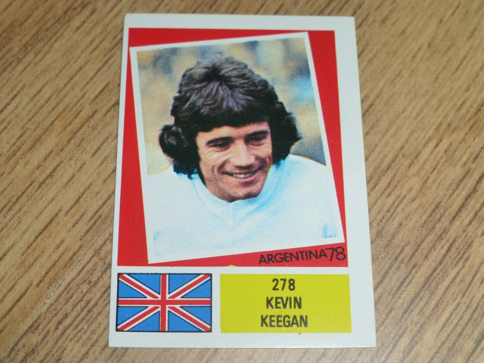 Kevin Keegan Sporting Sticker On Wood Table Background