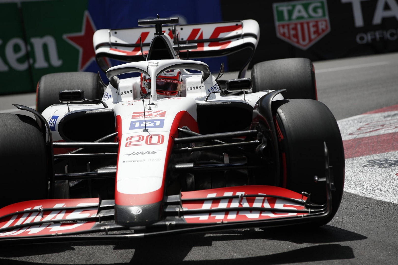 Kevin Magnussen Haas Car In Action Background