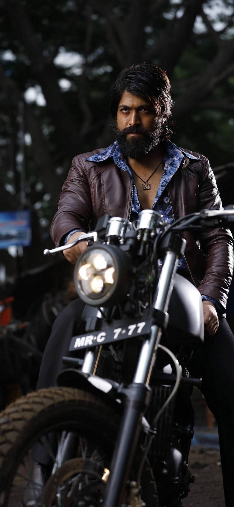Kgf Rocky On His Motorcycle Background