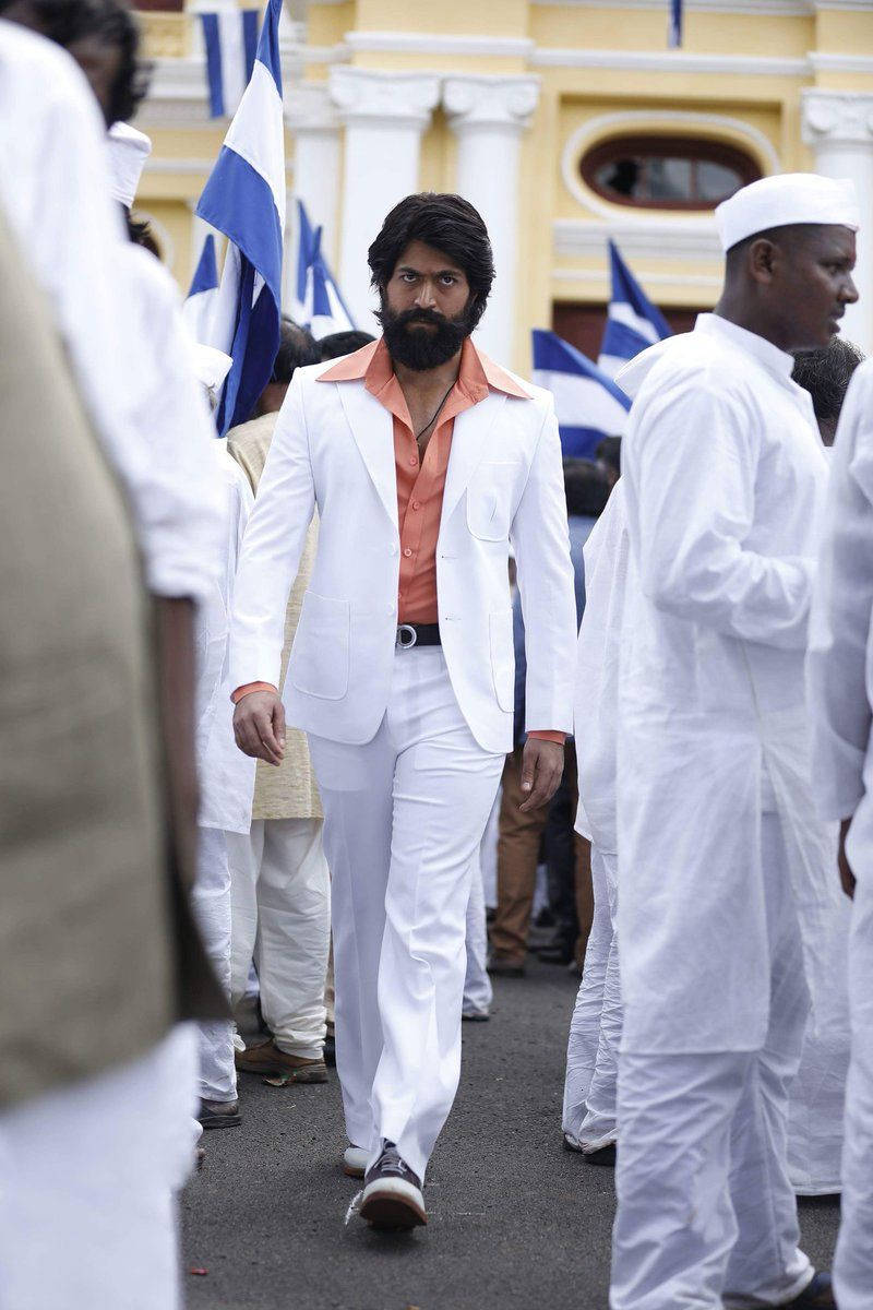 Kgf Yash In White Suit Background