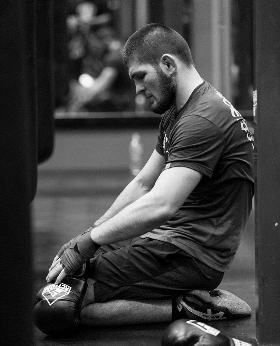 Khabib Nurmagomedov Kneeling Background