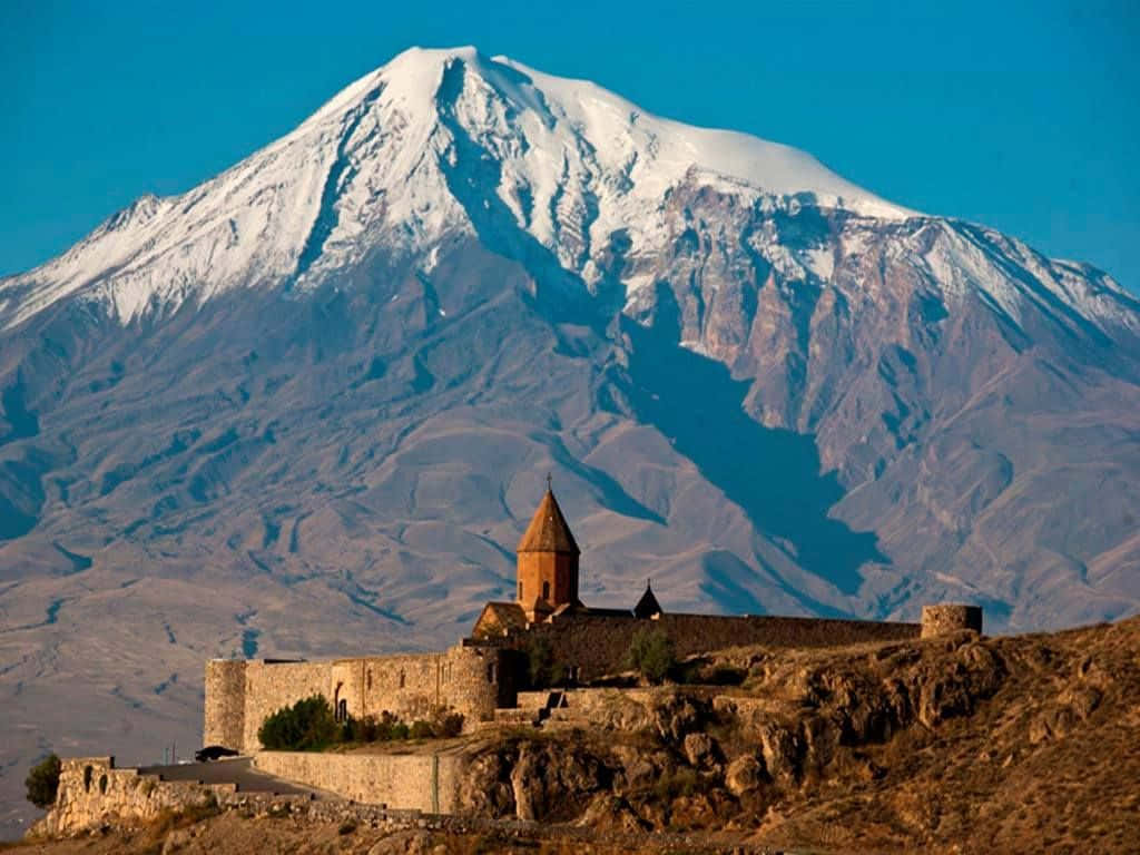 Khor Virap In Armenia With Volcano Background
