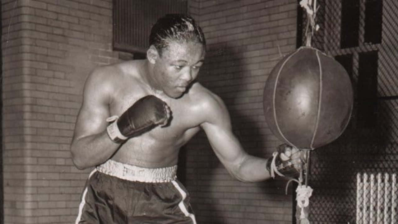 Kid Gavilan Training Small Punching Bag Background