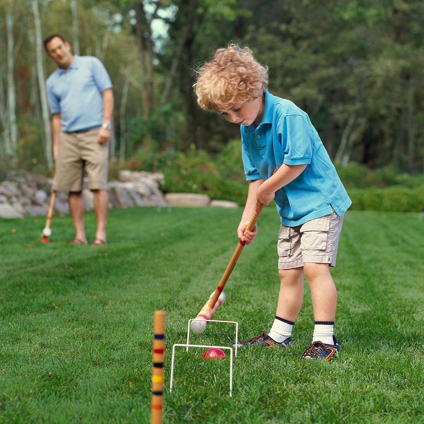 Kid With Croquet Background