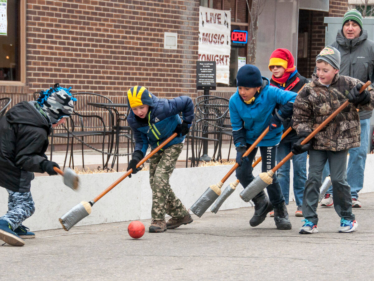 Kids Playing Broomball Background