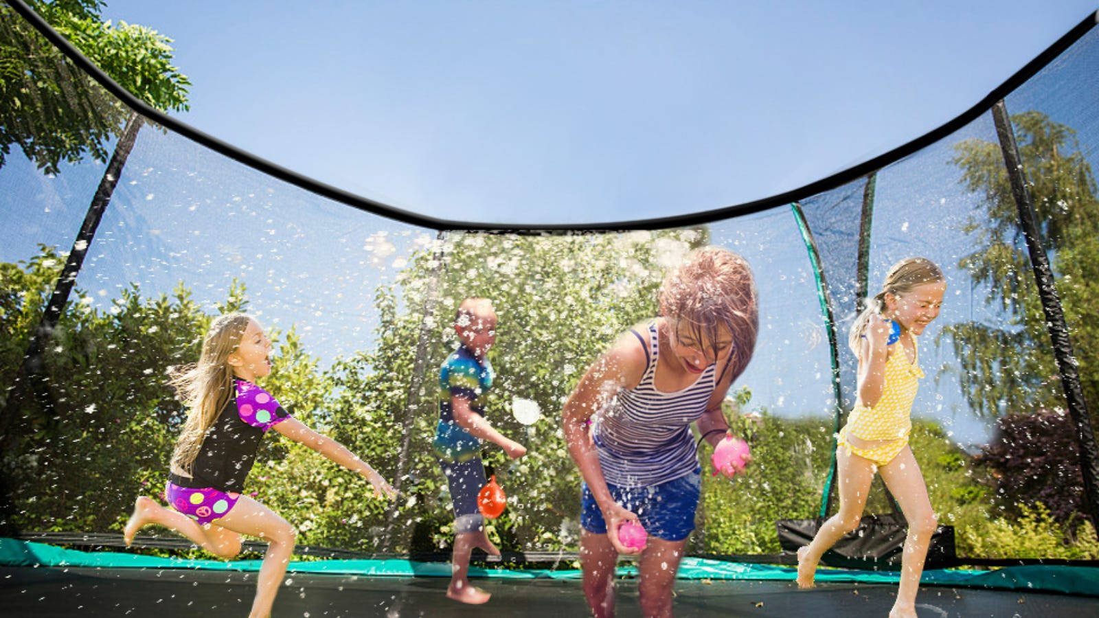 Kids Playing Inside A Trampoline Background