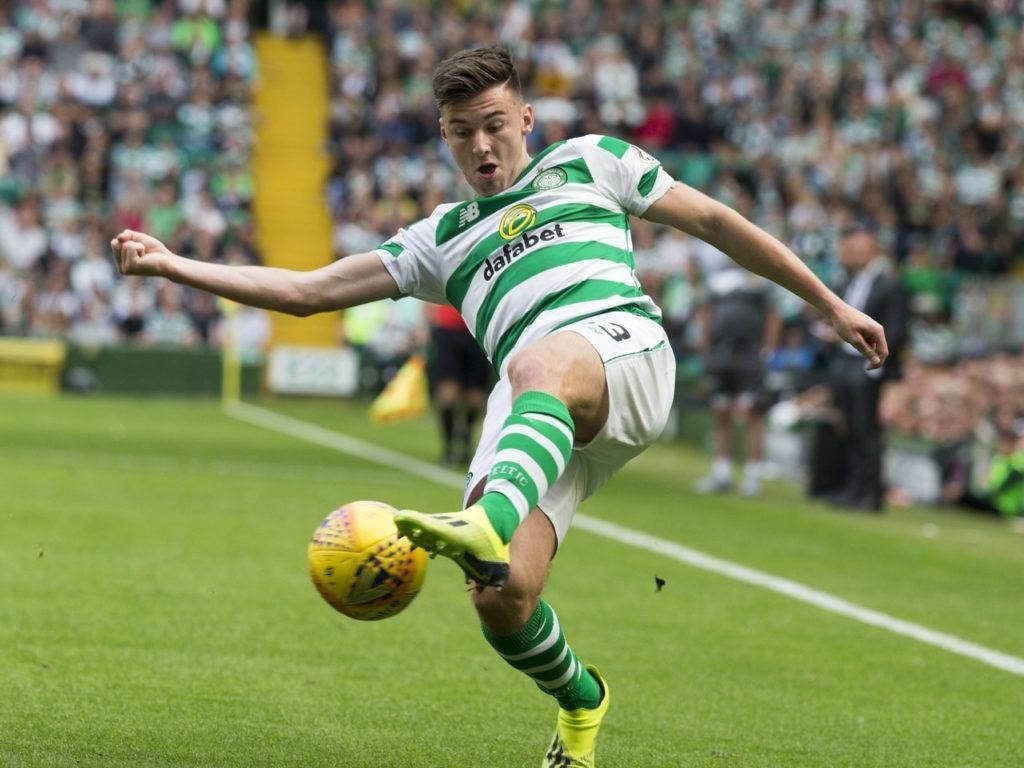 Kieran Tierney Kicking A Ball Background