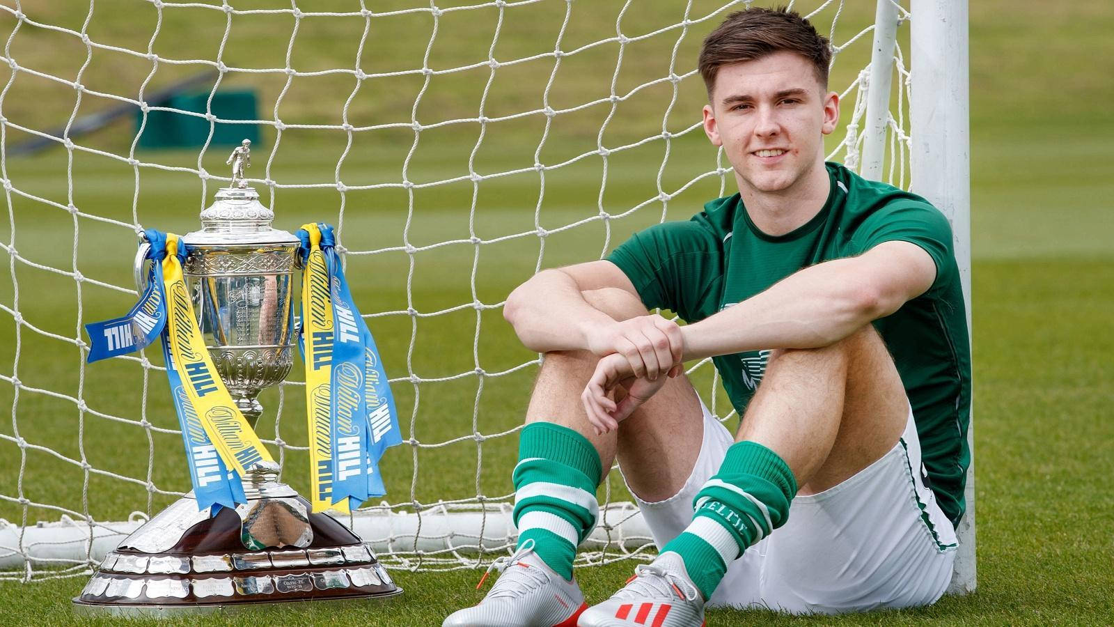 Kieran Tierney Leaning On Goal Posts Background