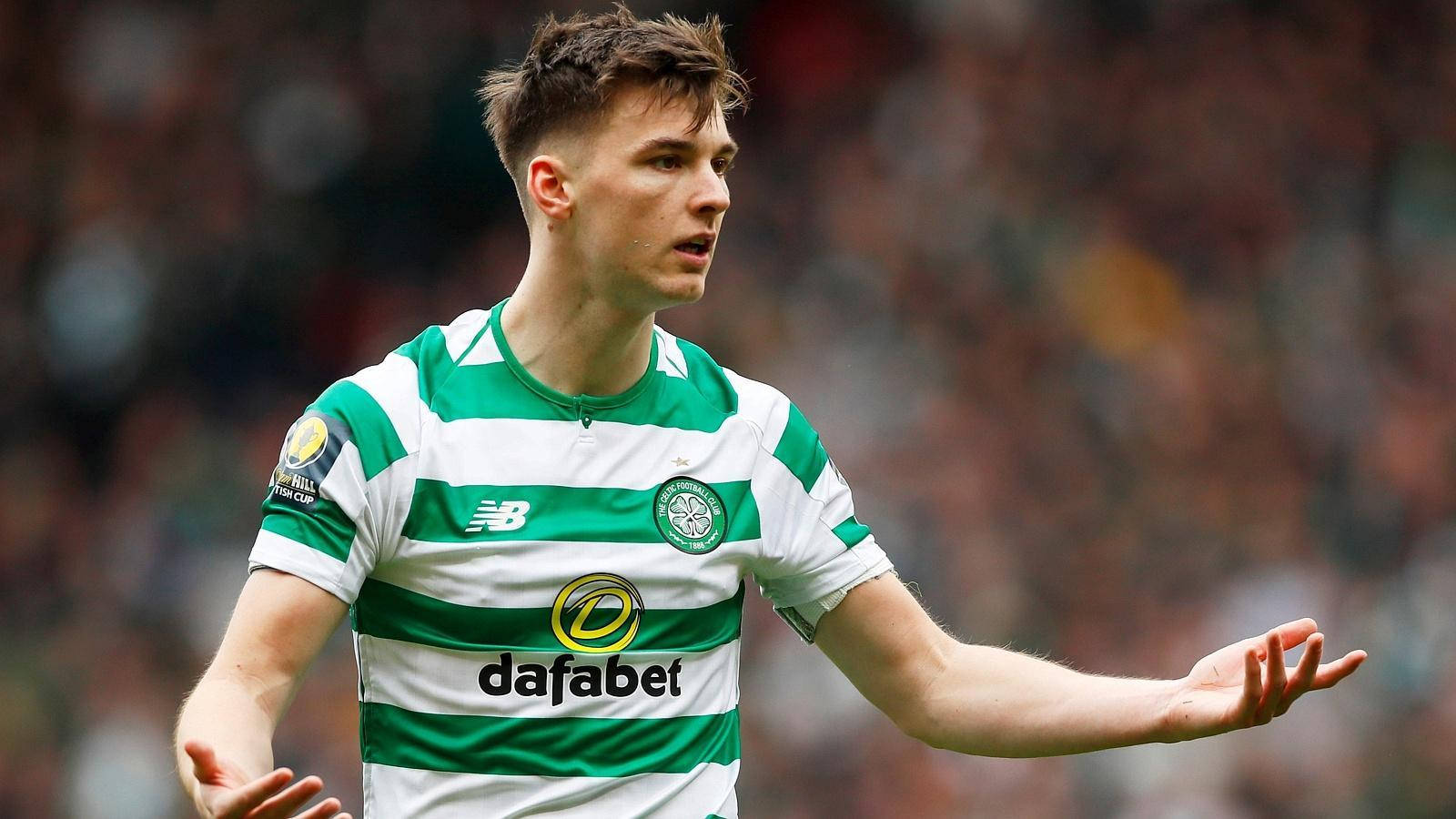 Kieran Tierney With Confused Expression Background