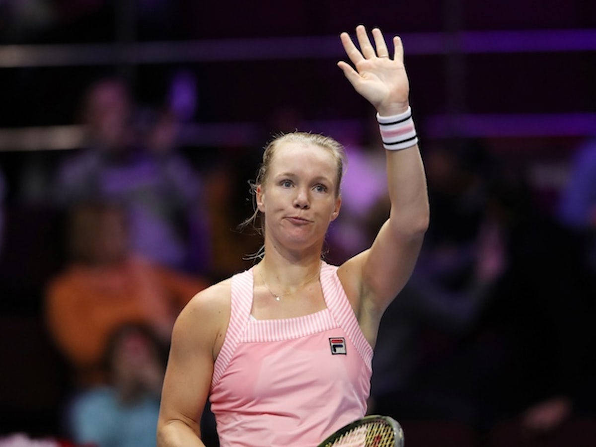 Kiki Bertens Acknowledging Her Fans With A Wave Background