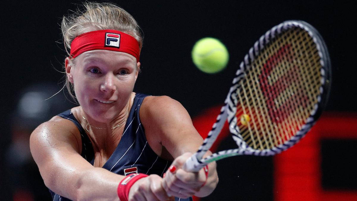 Kiki Bertens Focused On The Ball Background