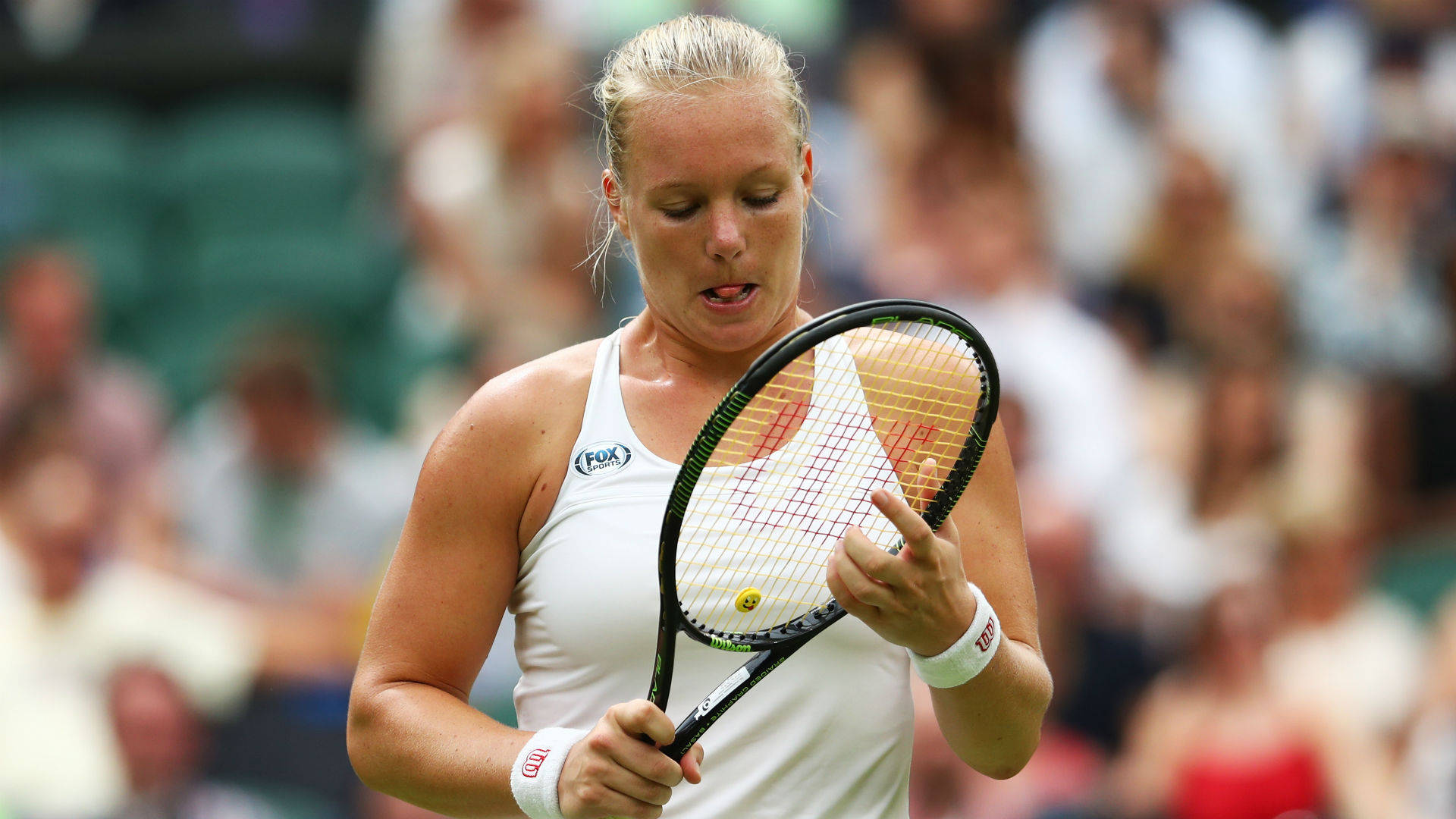 Kiki Bertens Touching Racket