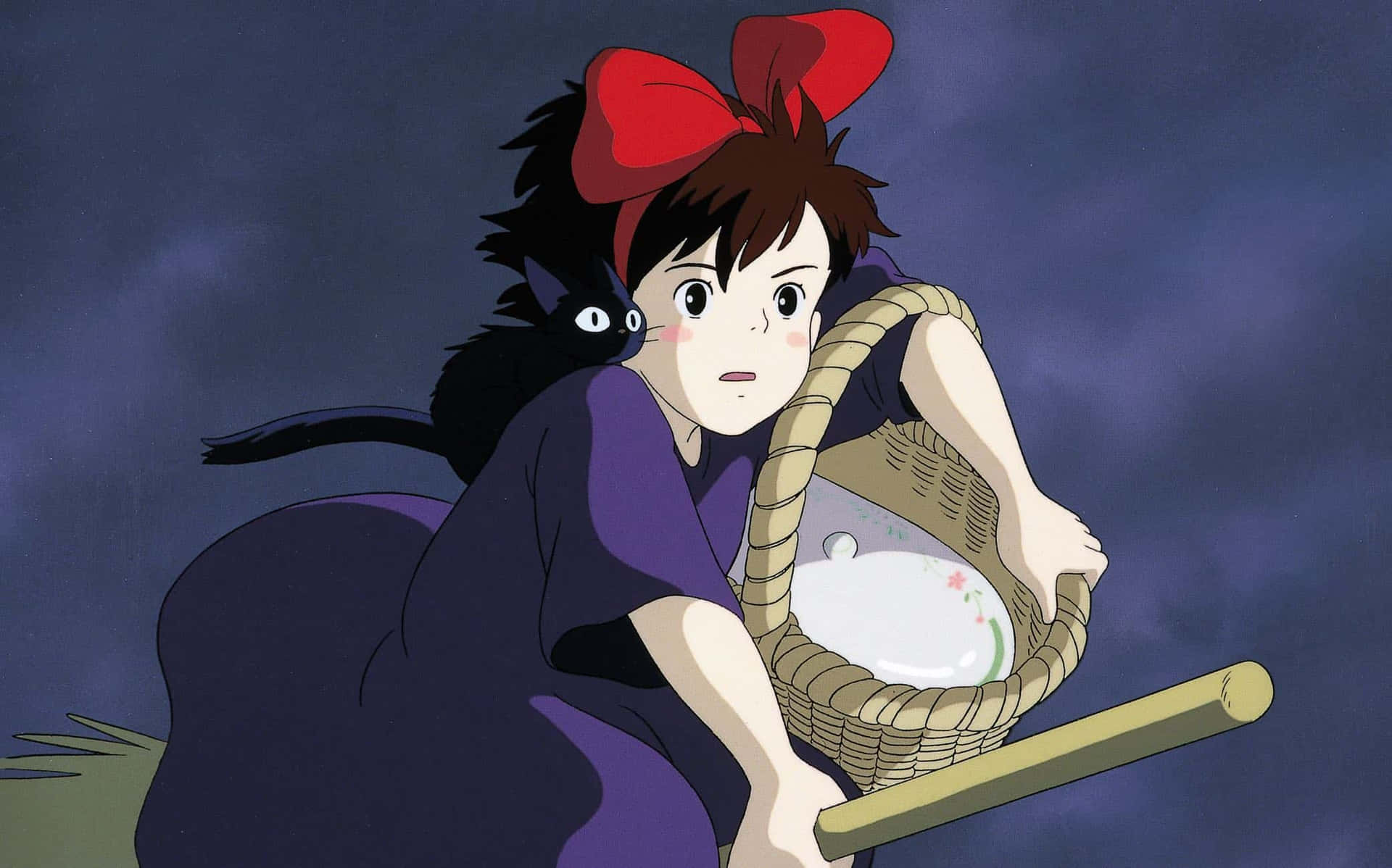 Kiki's Delivery Service - Kiki Soaring Over The City On Her Broomstick Background