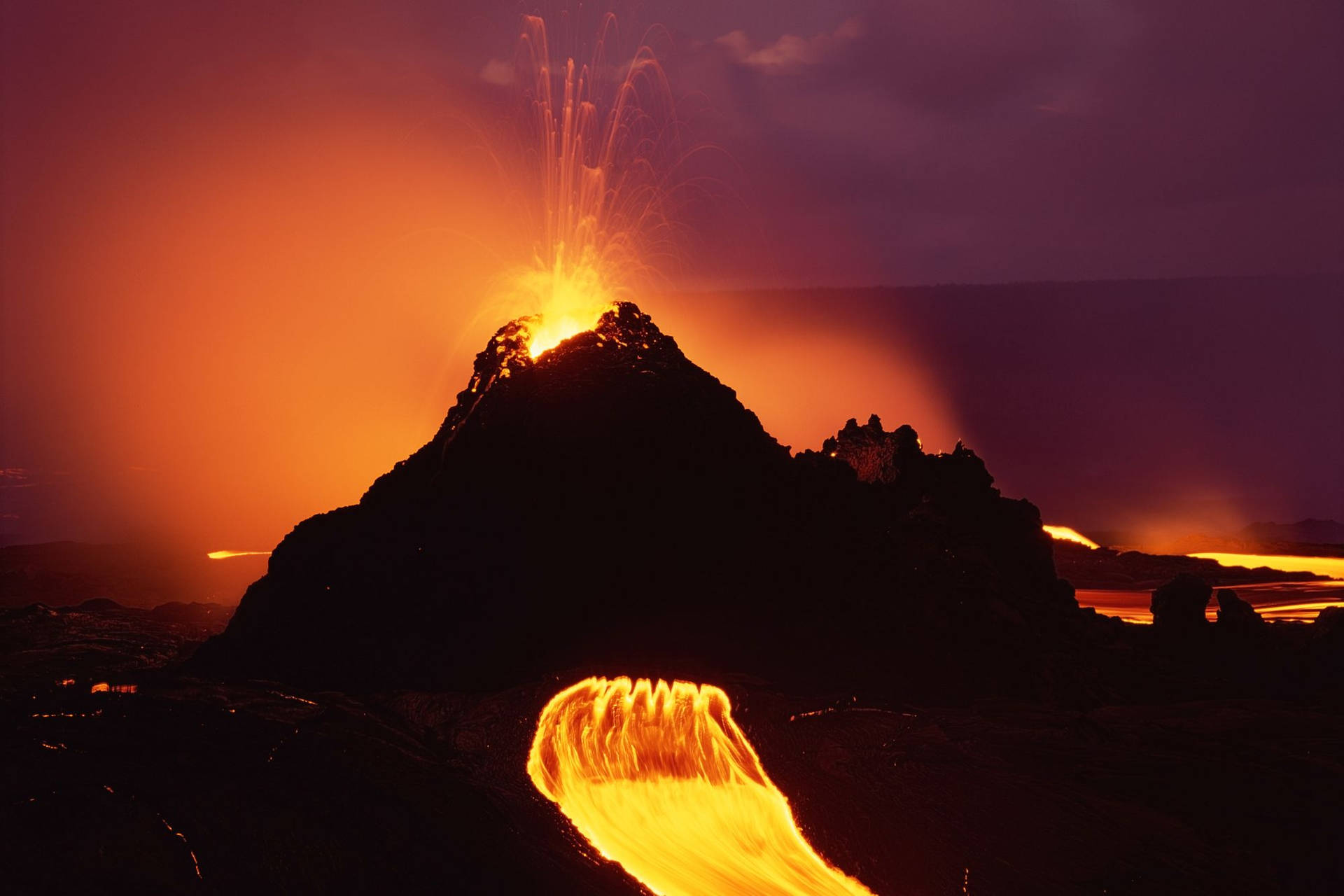 Kilauea Volcano Lava Flowing Dark Orange Background