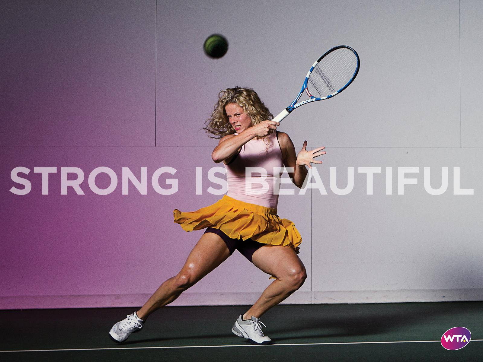 Kim Clijsters Demonstrating Strength On The Tennis Court Background