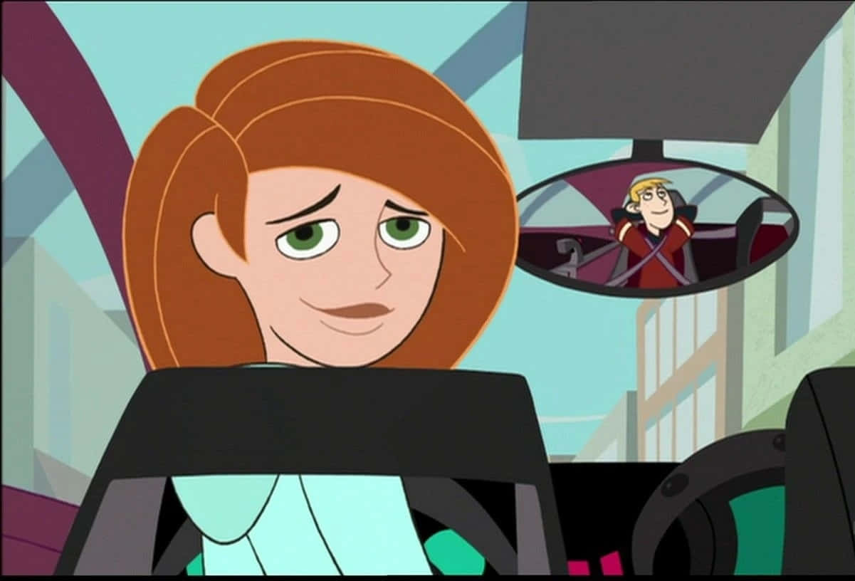 Kim Possible And Ron Stoppable In Action Background