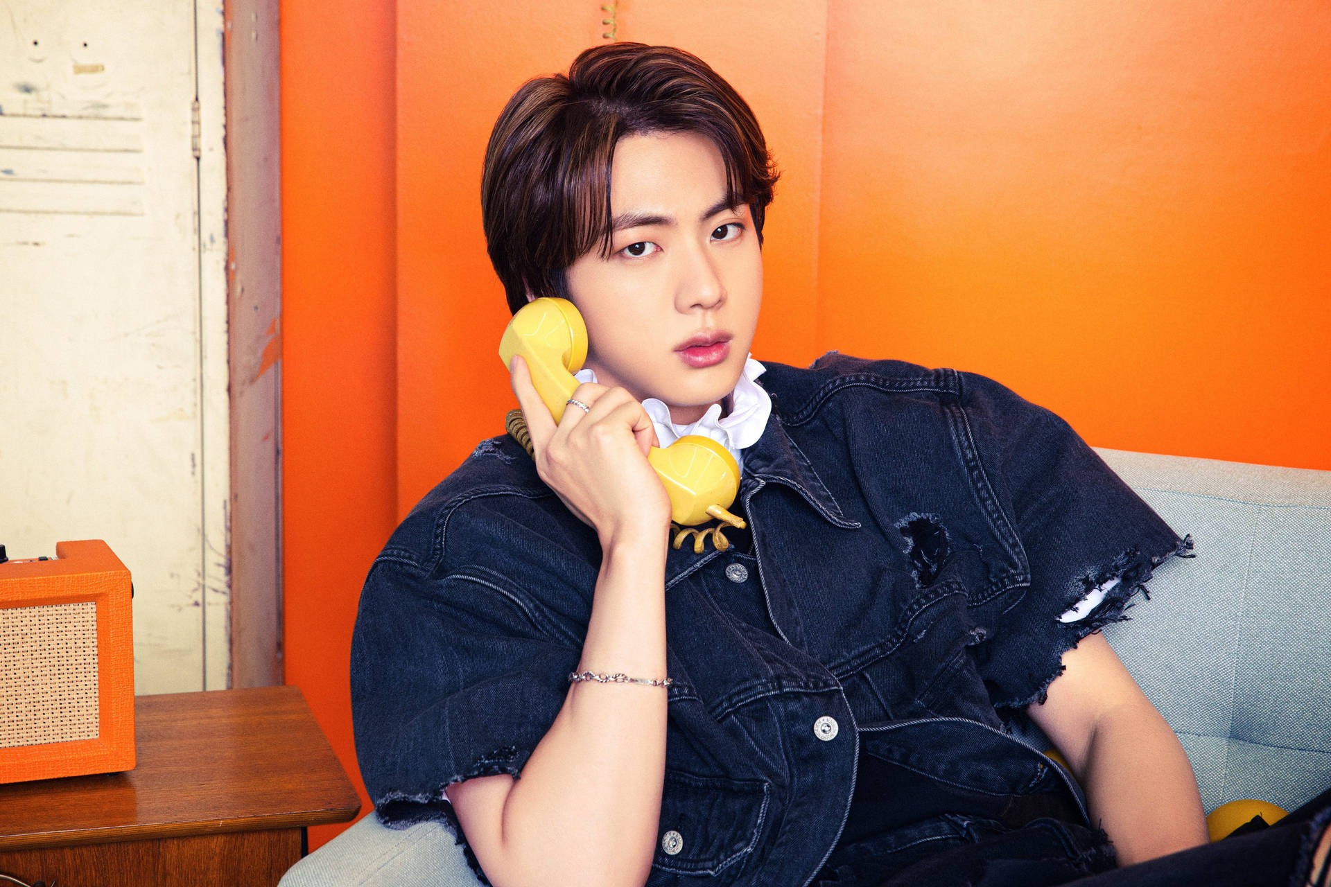 Kim Seok Jin With Yellow Telephone Background