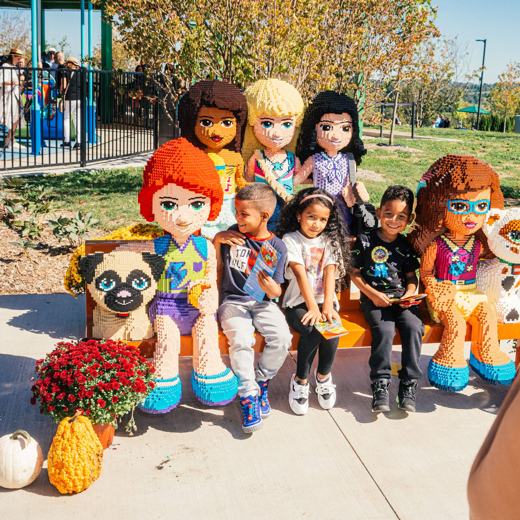 Kinds On Bench At Legoland Background