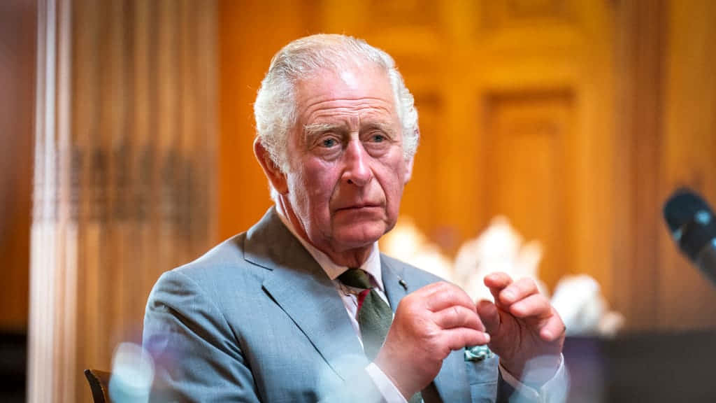 King Charles Iii With Swollen Fingers Background