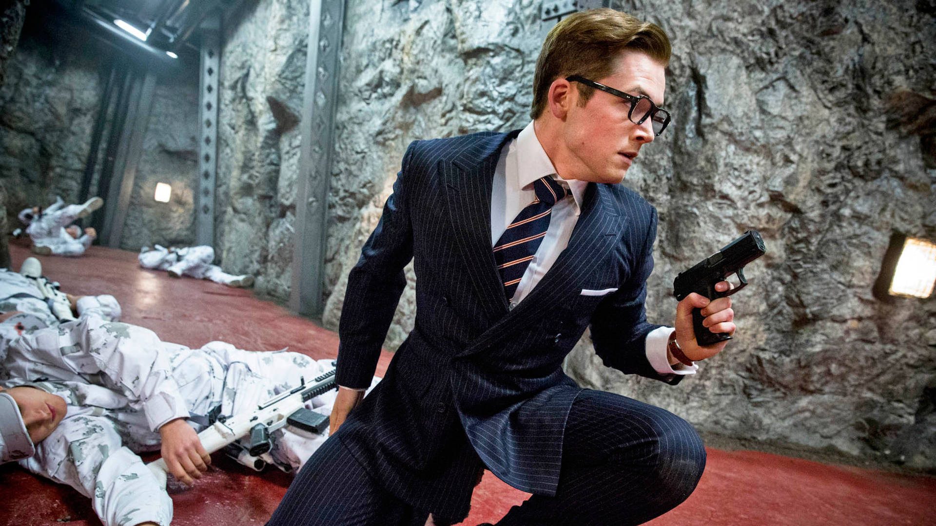 Kingsman The Secret Service Eggsy In A Suit Background