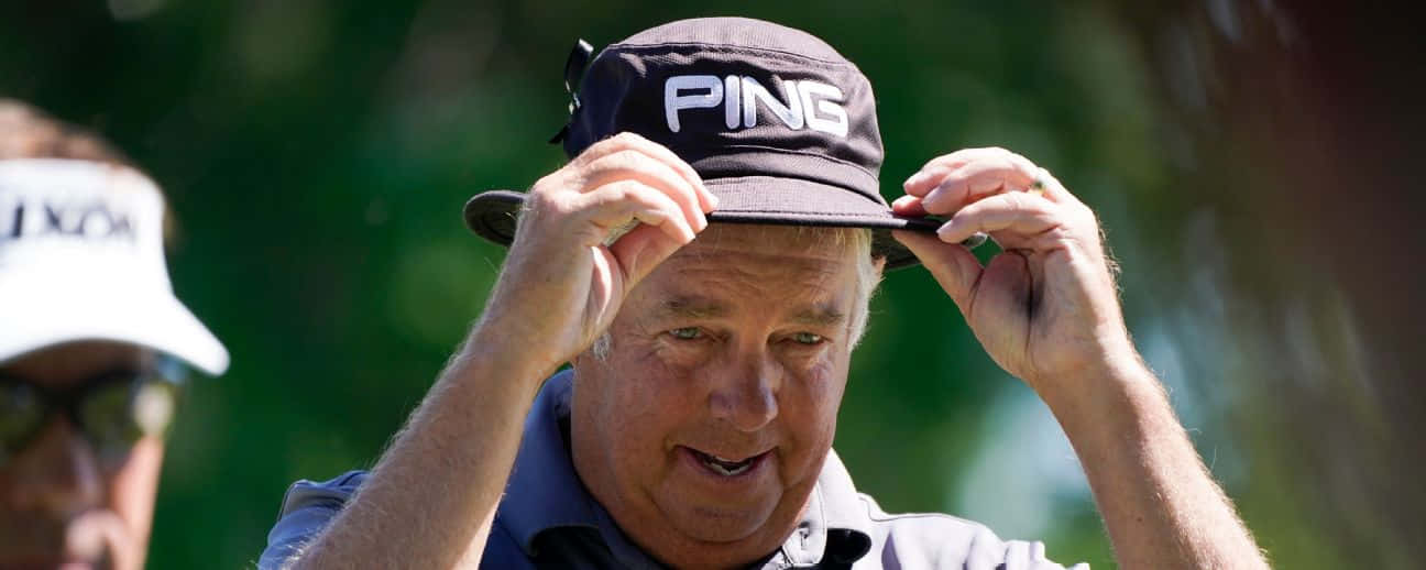 Kirk Triplett Fixing His Hat