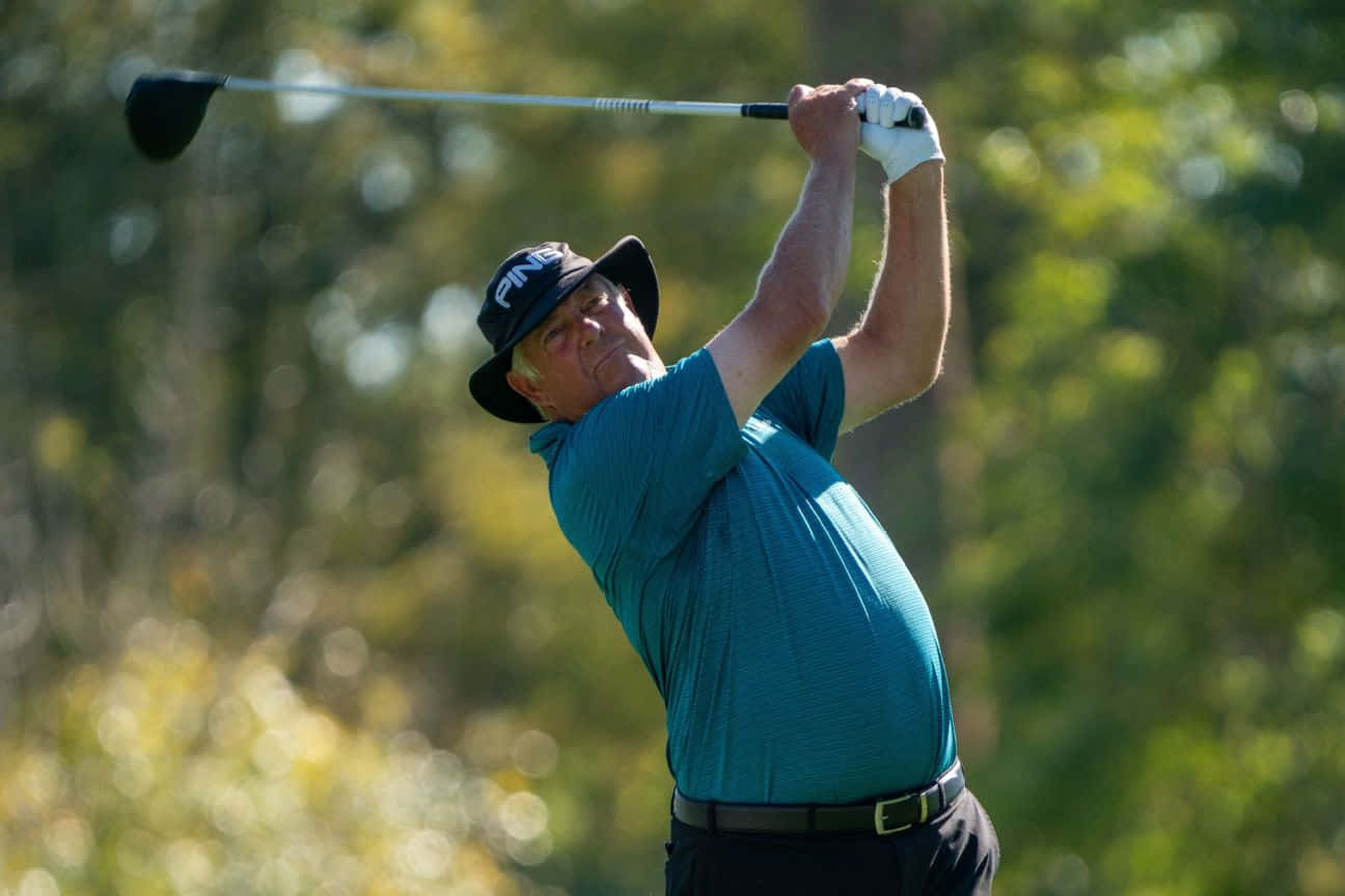 Kirk Triplett In Action During A Golf Tournament