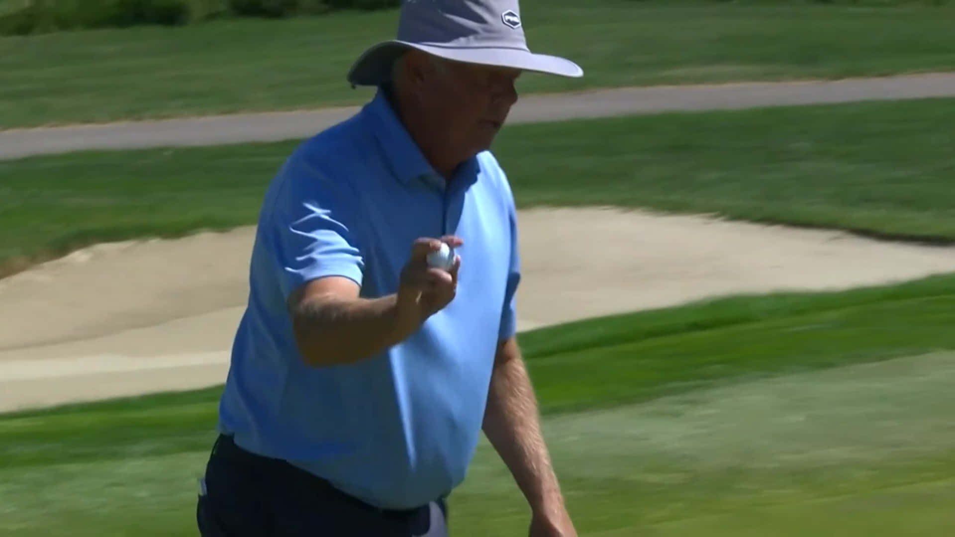 Kirk Triplett On A Golf Course Background