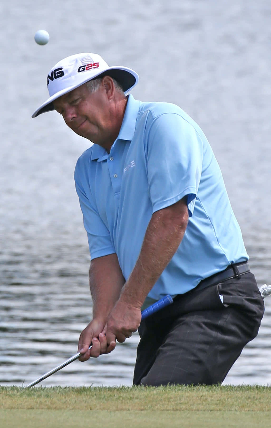 Kirk Triplett Playing Golf Background