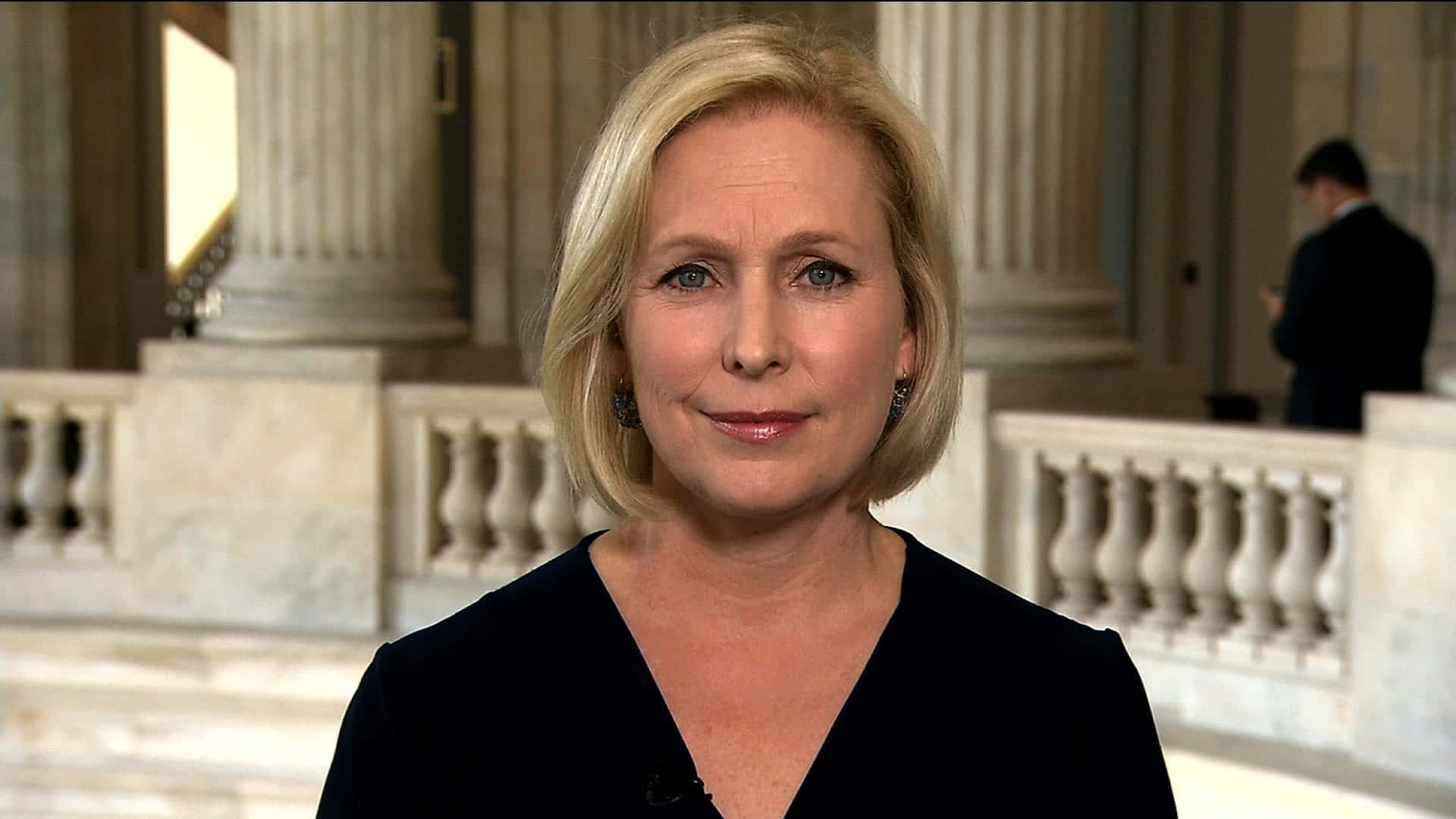 Kirsten Gillibrand In Elegant Black Dress At The Capitol Background