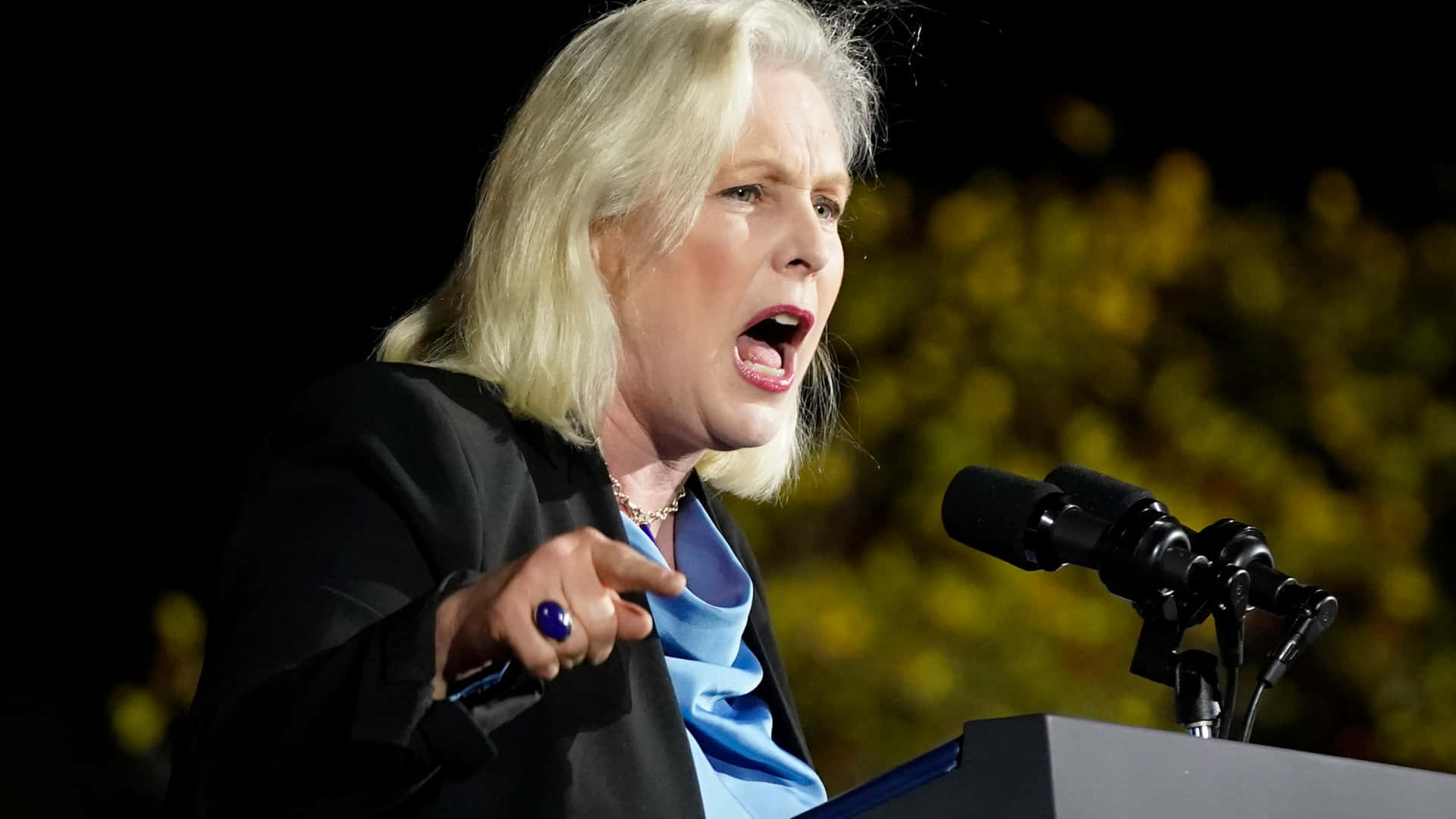 Kirsten Gillibrand Speaking Outside Night Background