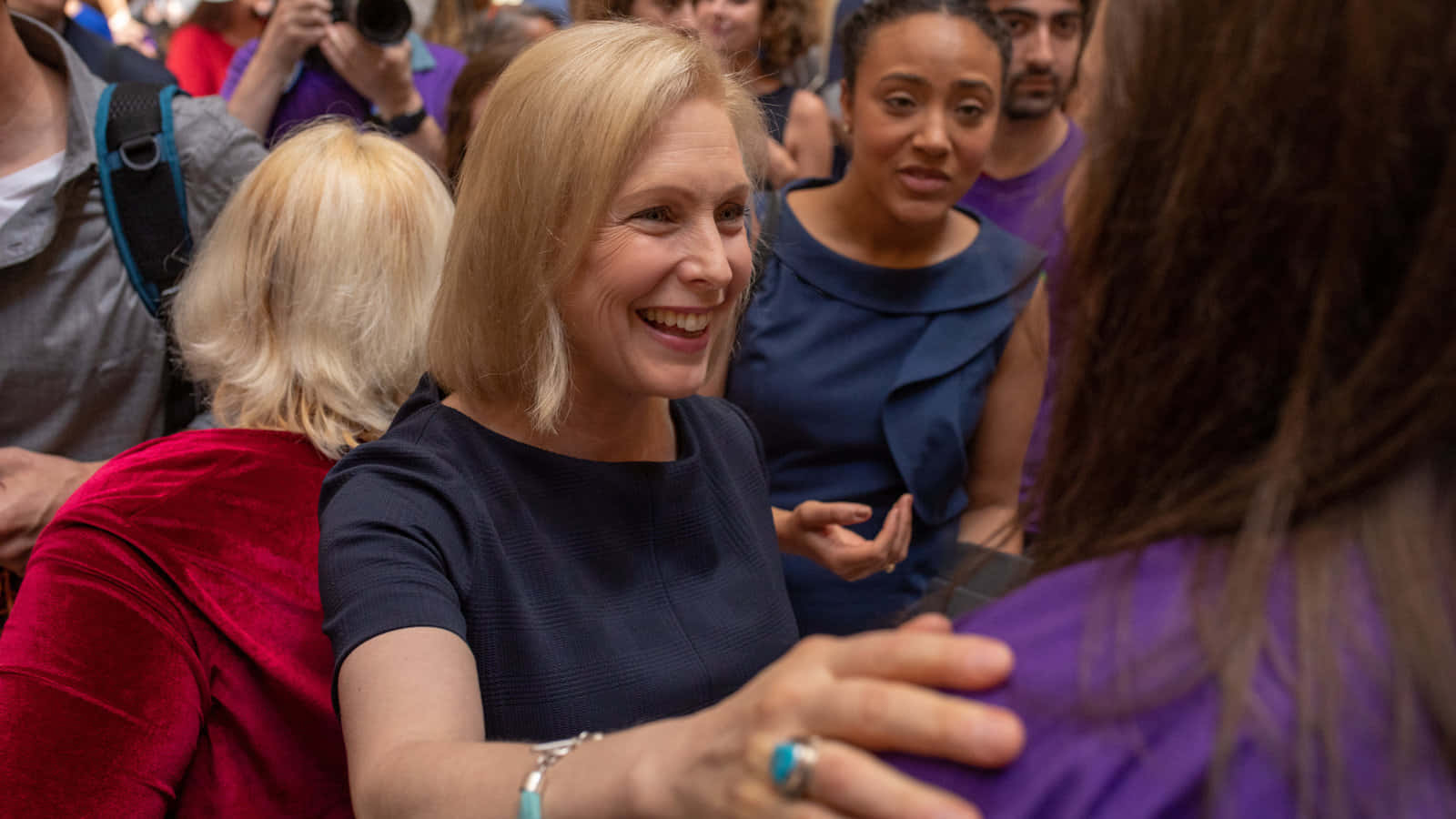 Kirsten Gillibrand Speaking With Women Background