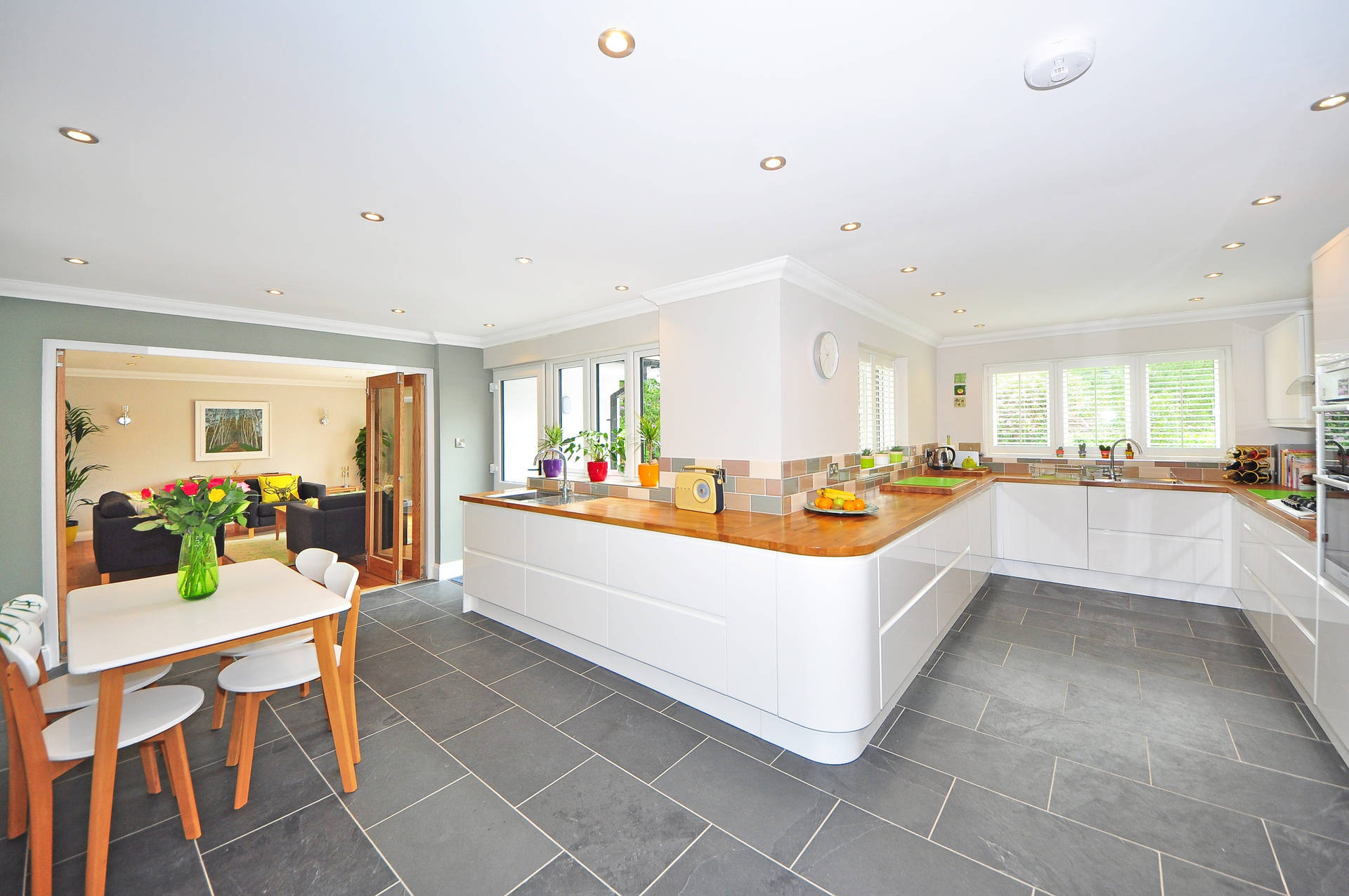 Kitchen Design With Gray Tiled Floors Background