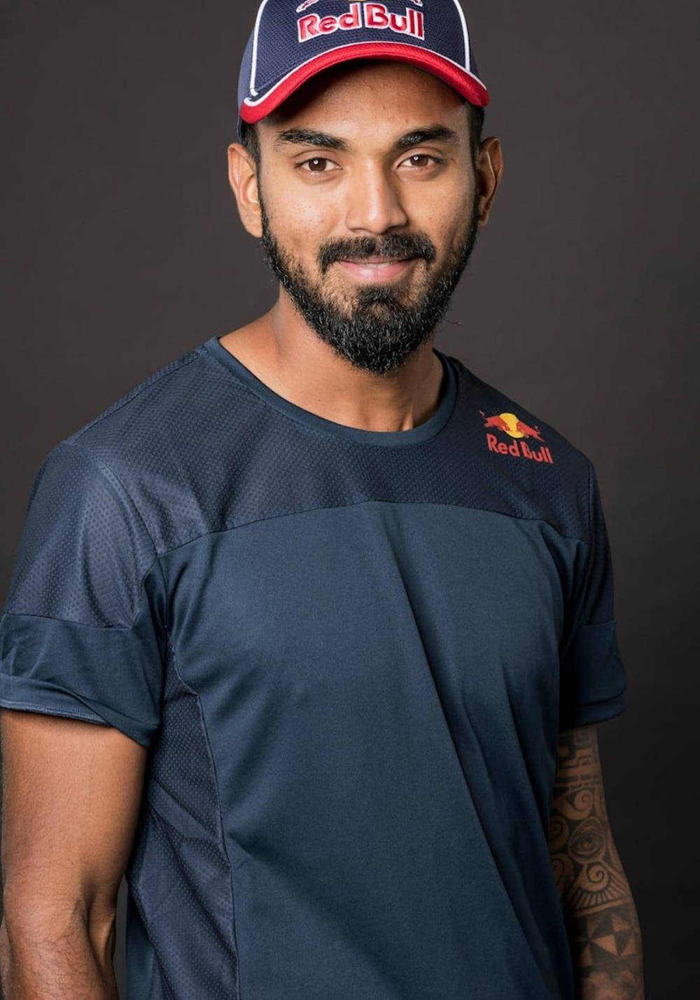 Kl Rahul Smiling For Red Bull Background