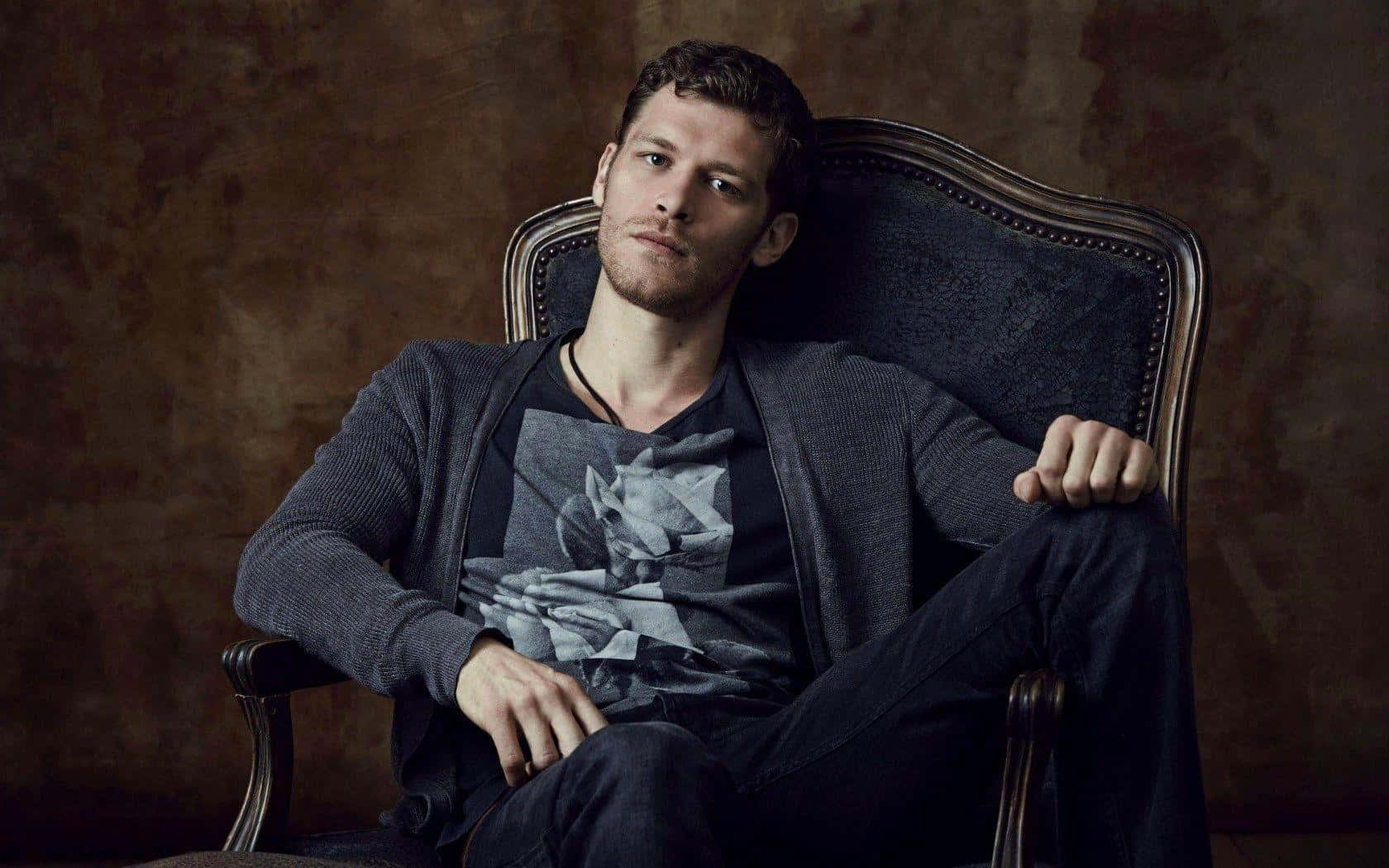 Klaus Mikaelson Posing On A Chair