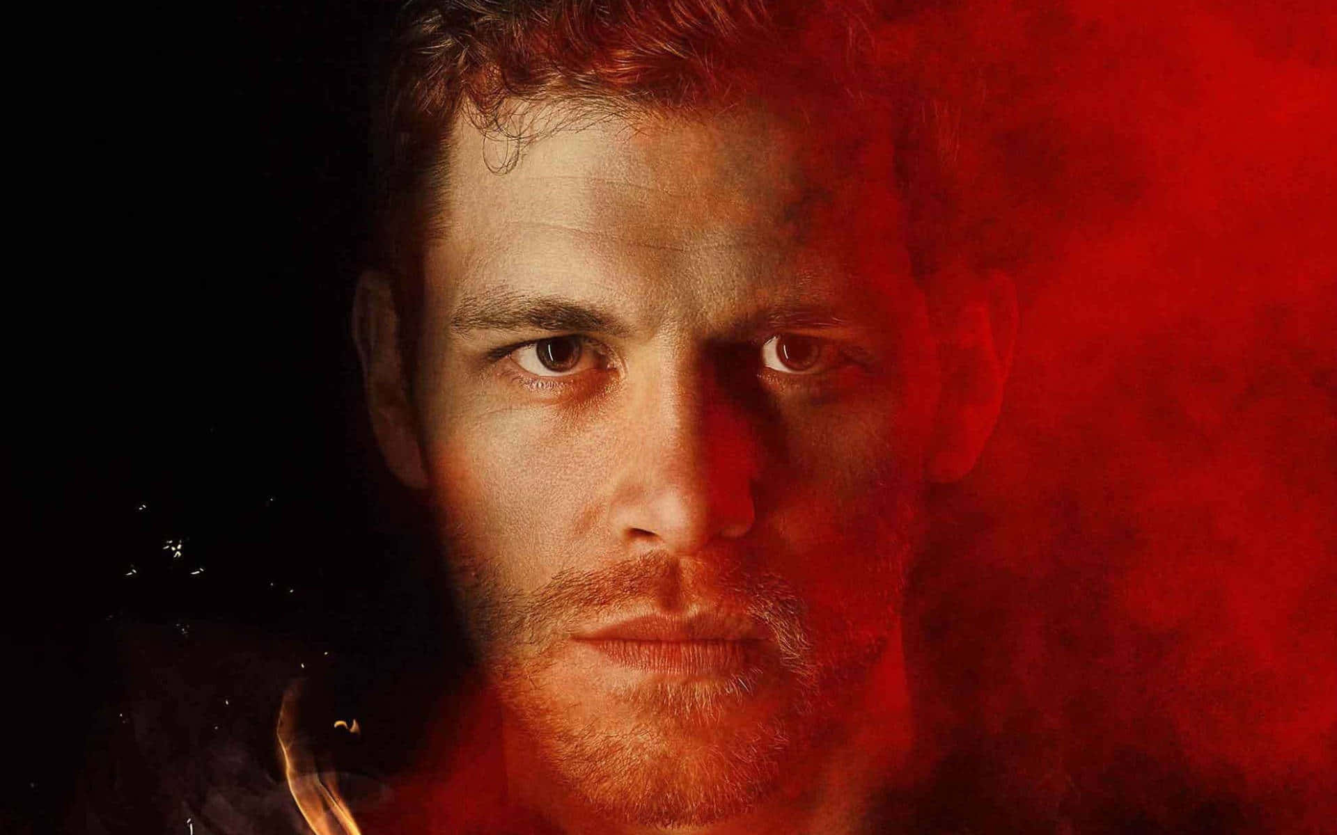 Klaus Mikaelson With Red Smoke Background