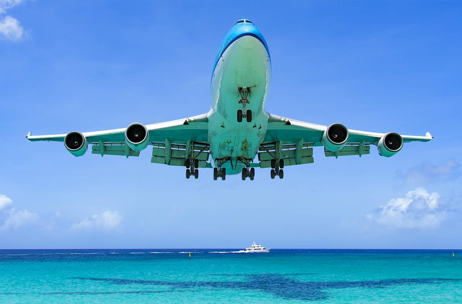 Klm Royal Aviation Company Above Ocean Water Background